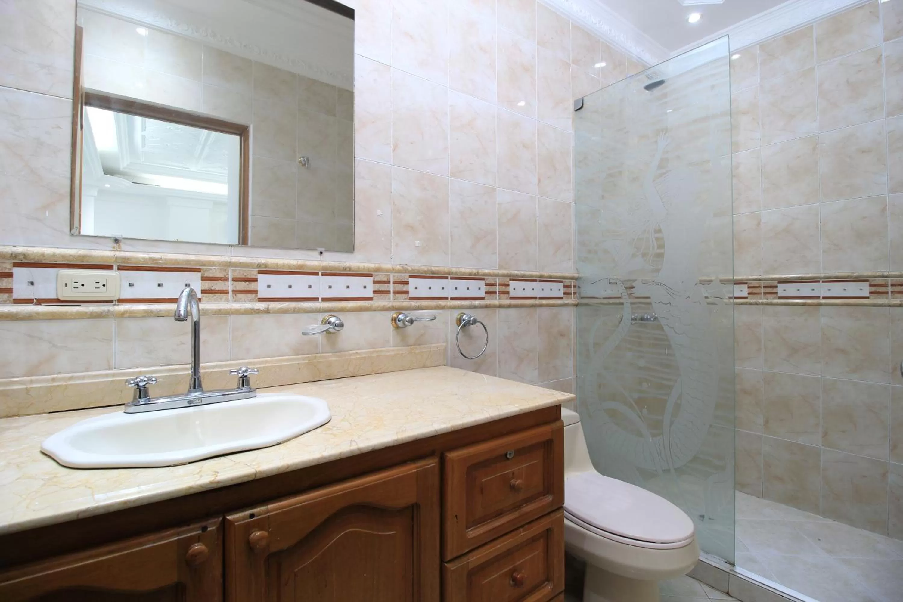 Shower in Hotel Abi Inn By GEH Suites