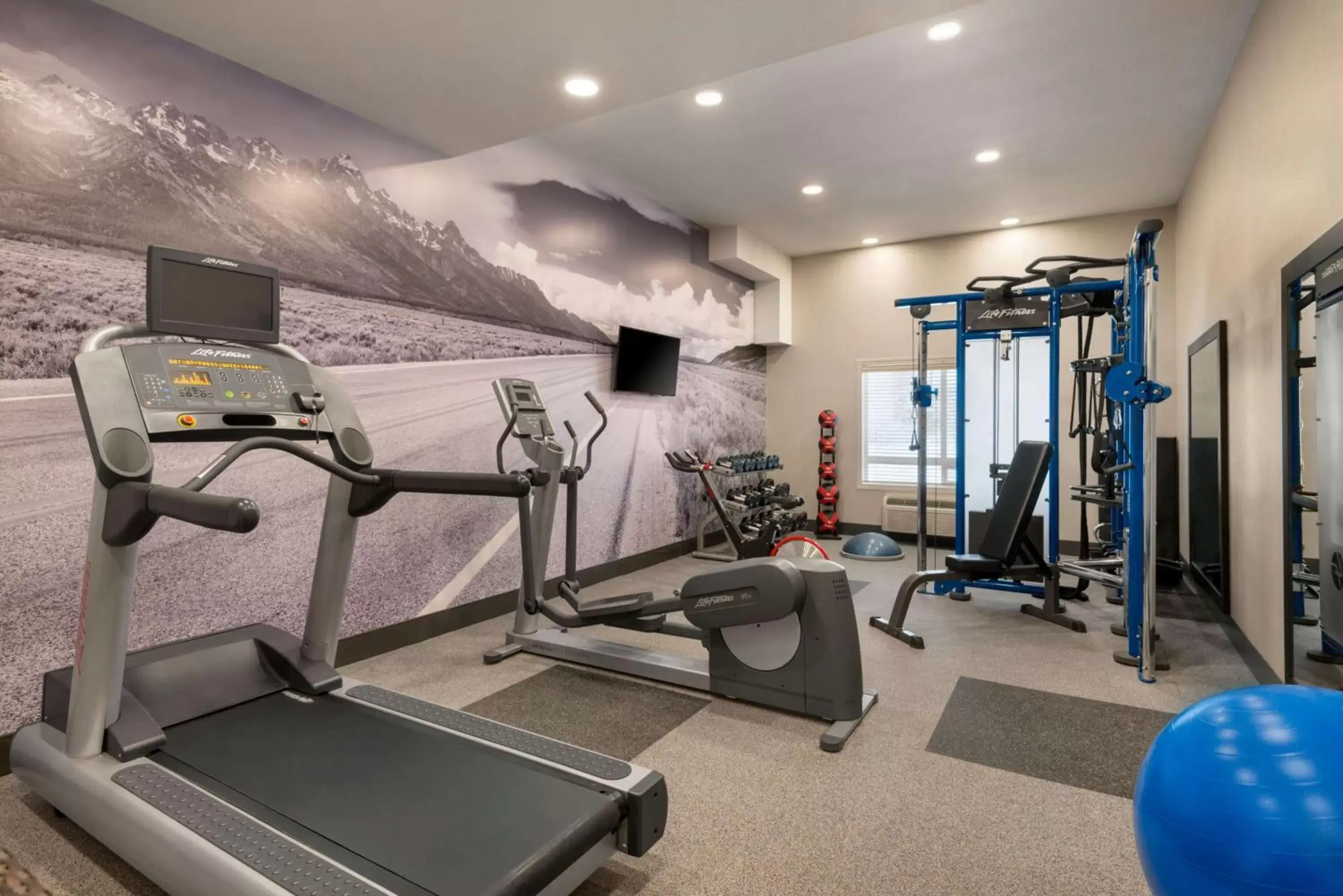 Fitness centre/facilities, Fitness Center/Facilities in Ramada by Wyndham Airdrie Hotel & Suites