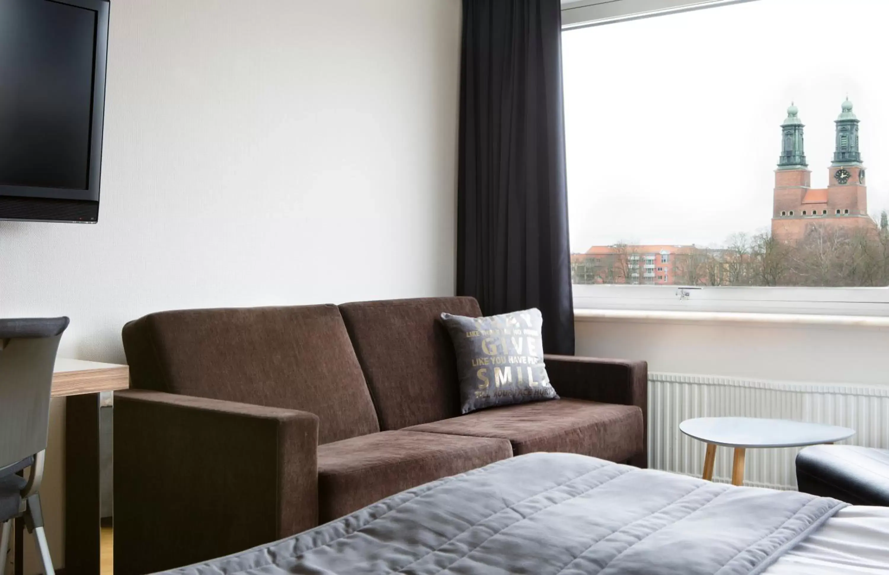 Bed, Seating Area in Comfort Hotel Eskilstuna