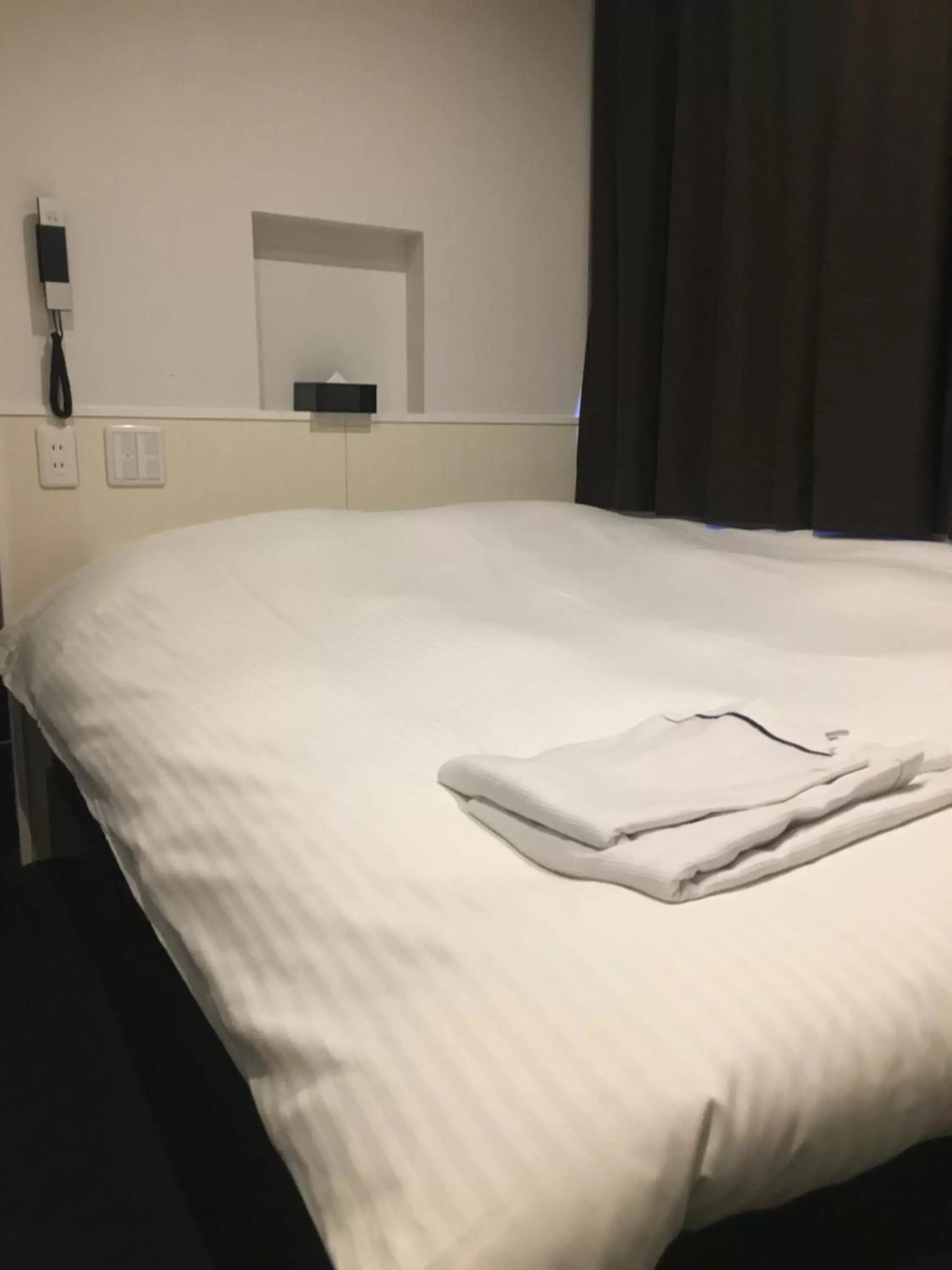 Bed in Nagoyaeki Access Hotel