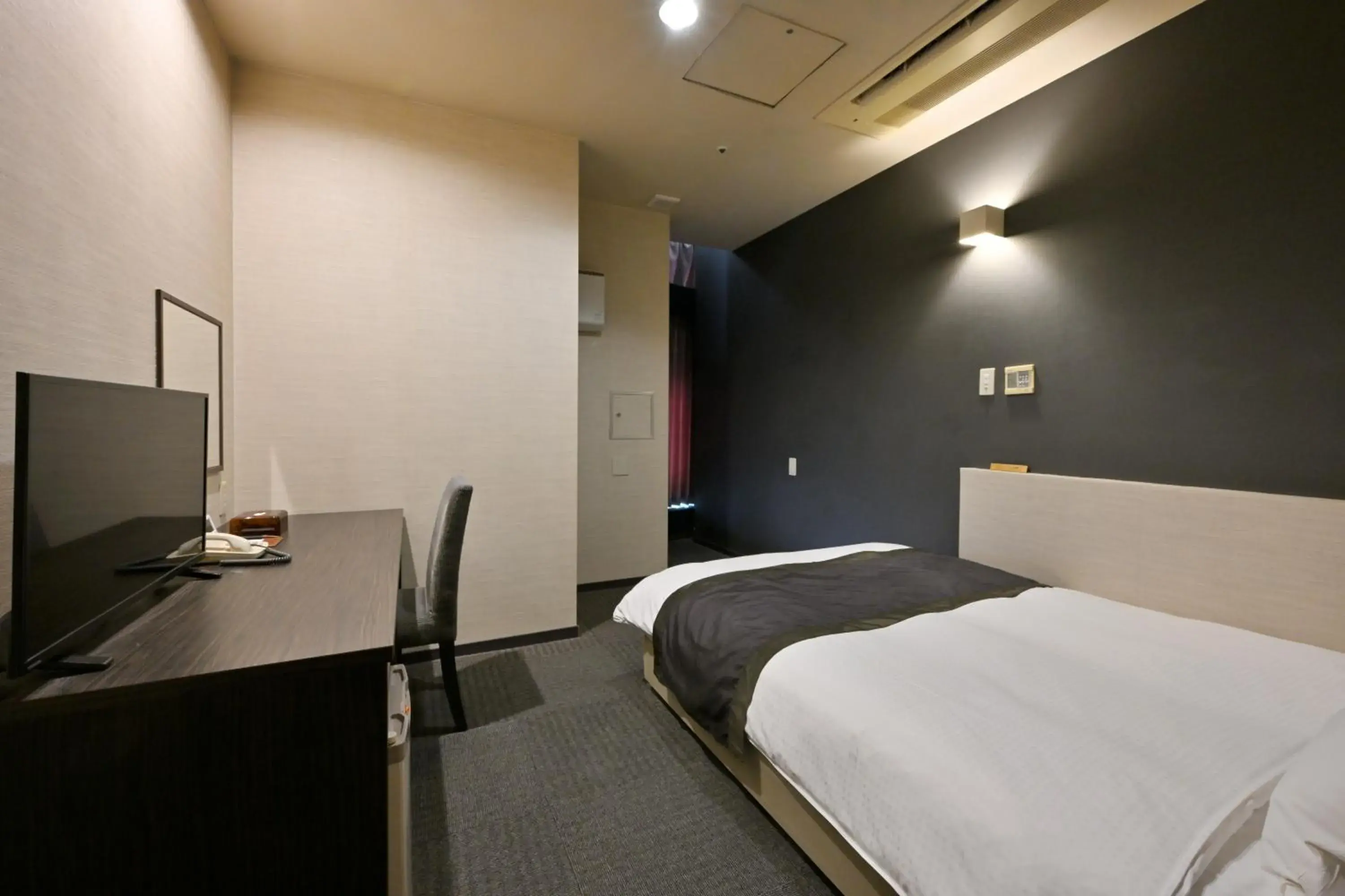 Bed in Wakayama Urban Hotel