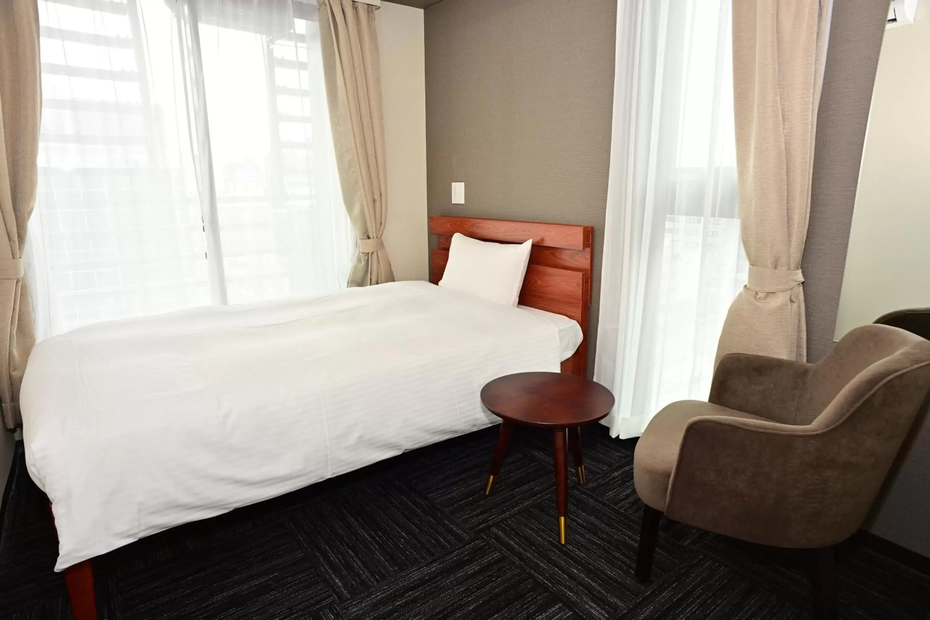 Bed in BRILLIANCE Hotel Bed in BRILLIANCE Hotel