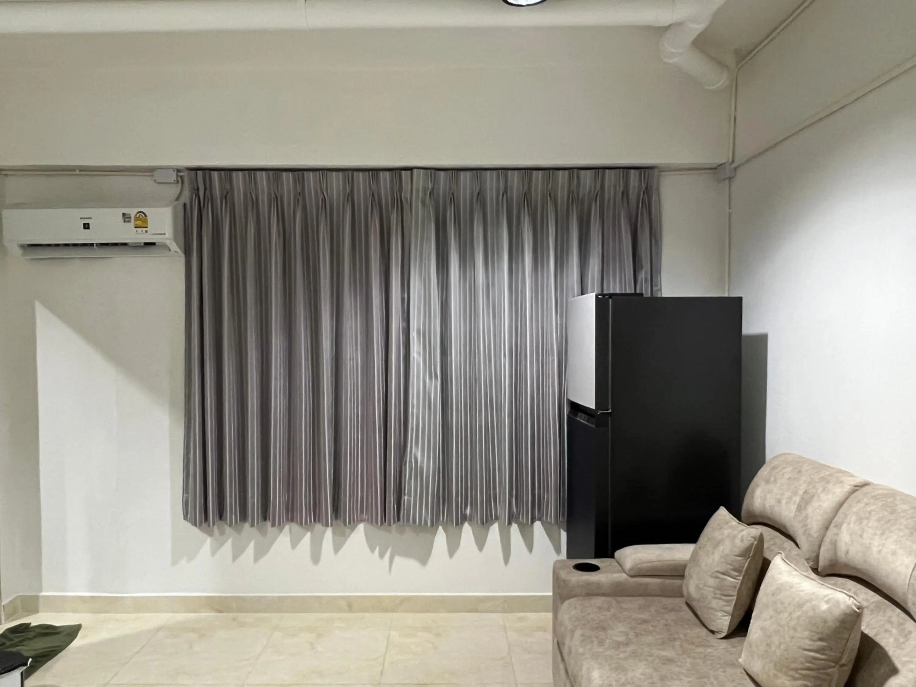 Seating area in Mall Suites Hotel