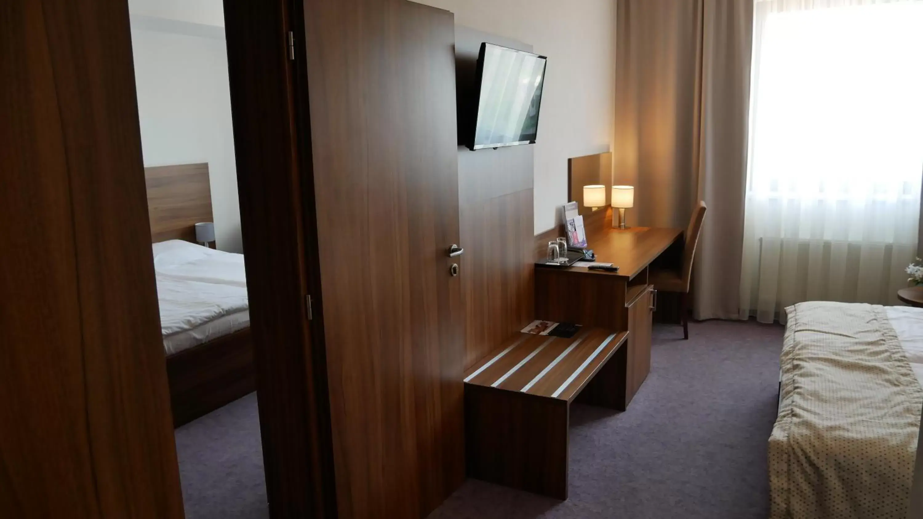 Bed in Hotel Saffron