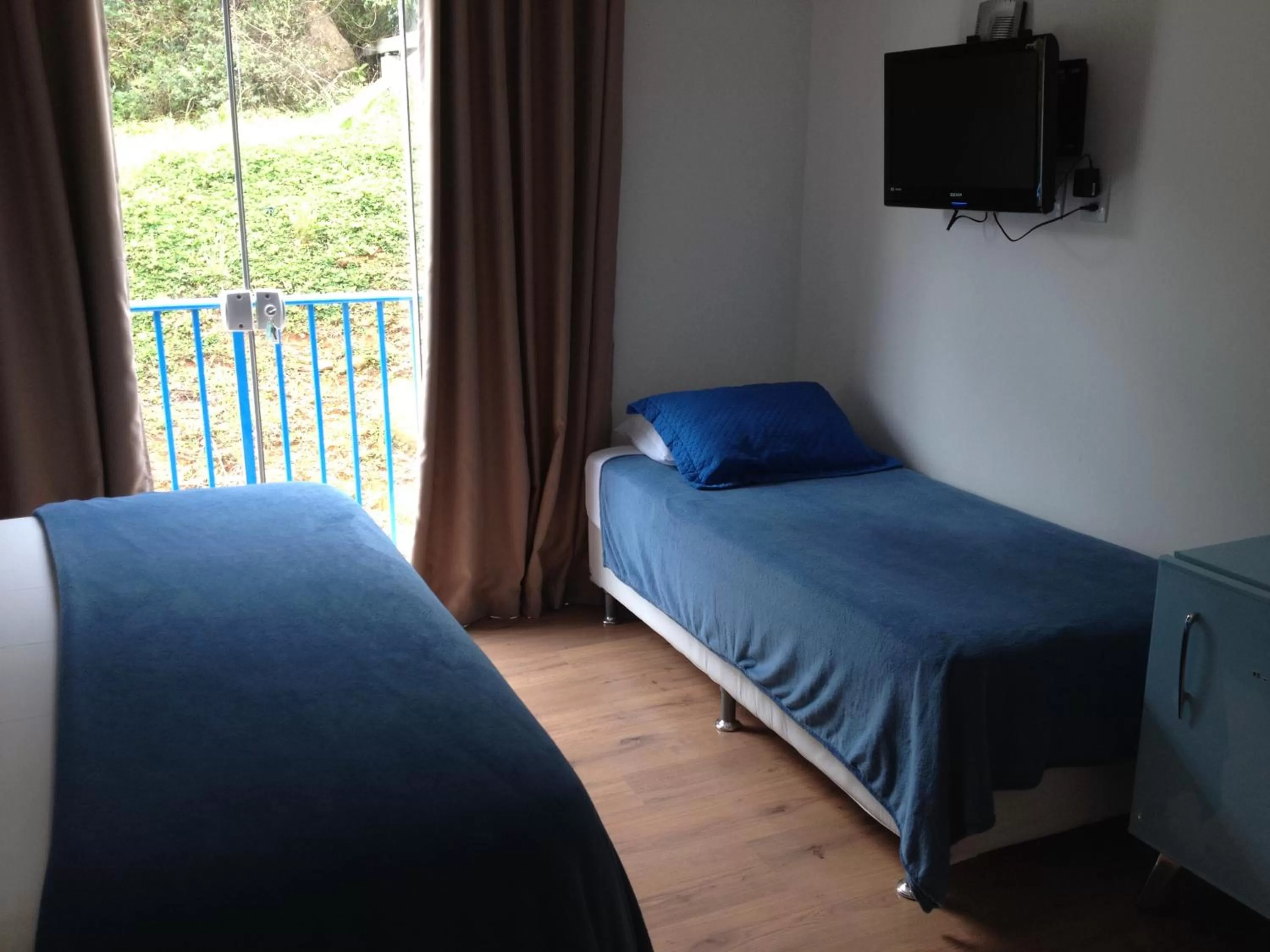 Bed in The Hyperion Boutique Hotel