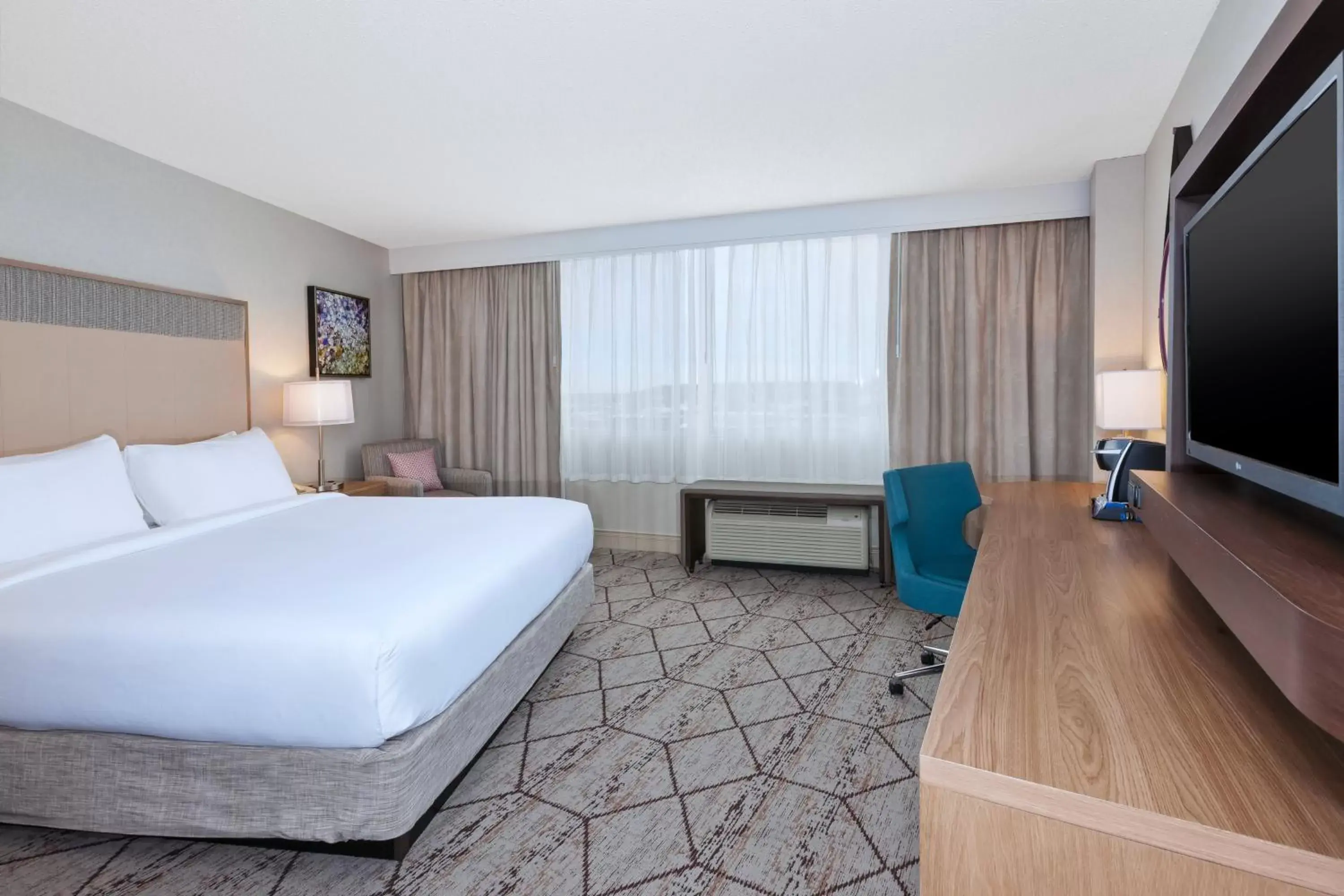 Photo of the whole room, Bed in Crowne Plaza Syracuse, an IHG Hotel