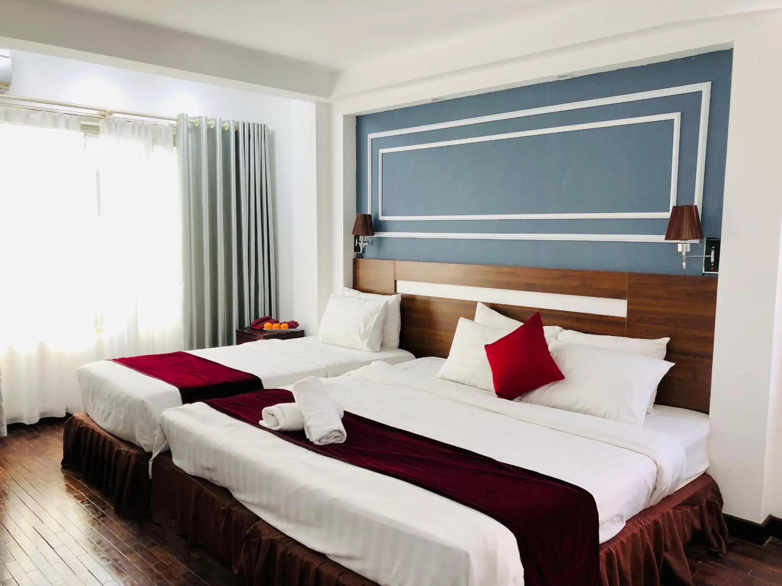 Triple Room with City View in Hanoi Sisters Boutique Hotel & Spa & Travel Triple Room with City View in Hanoi Sisters Boutique Hotel & Spa & Travel