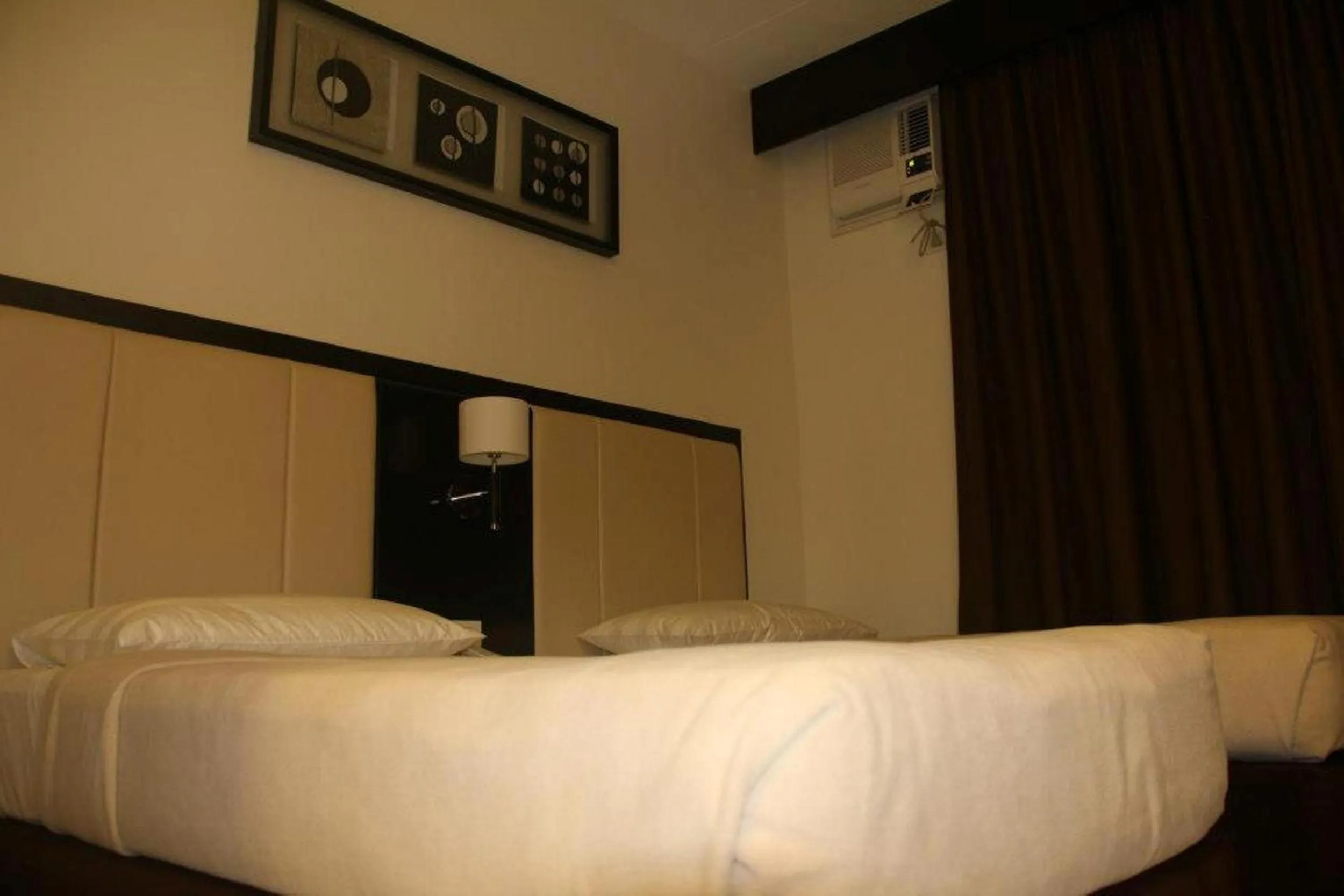 Photo of the whole room in Manhattan Suites Inn