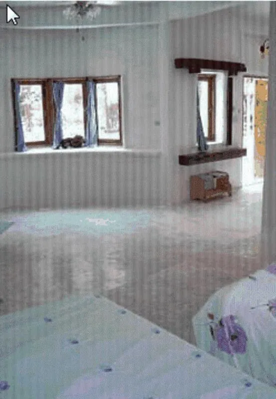 Bed in Scenic Riverside Resort