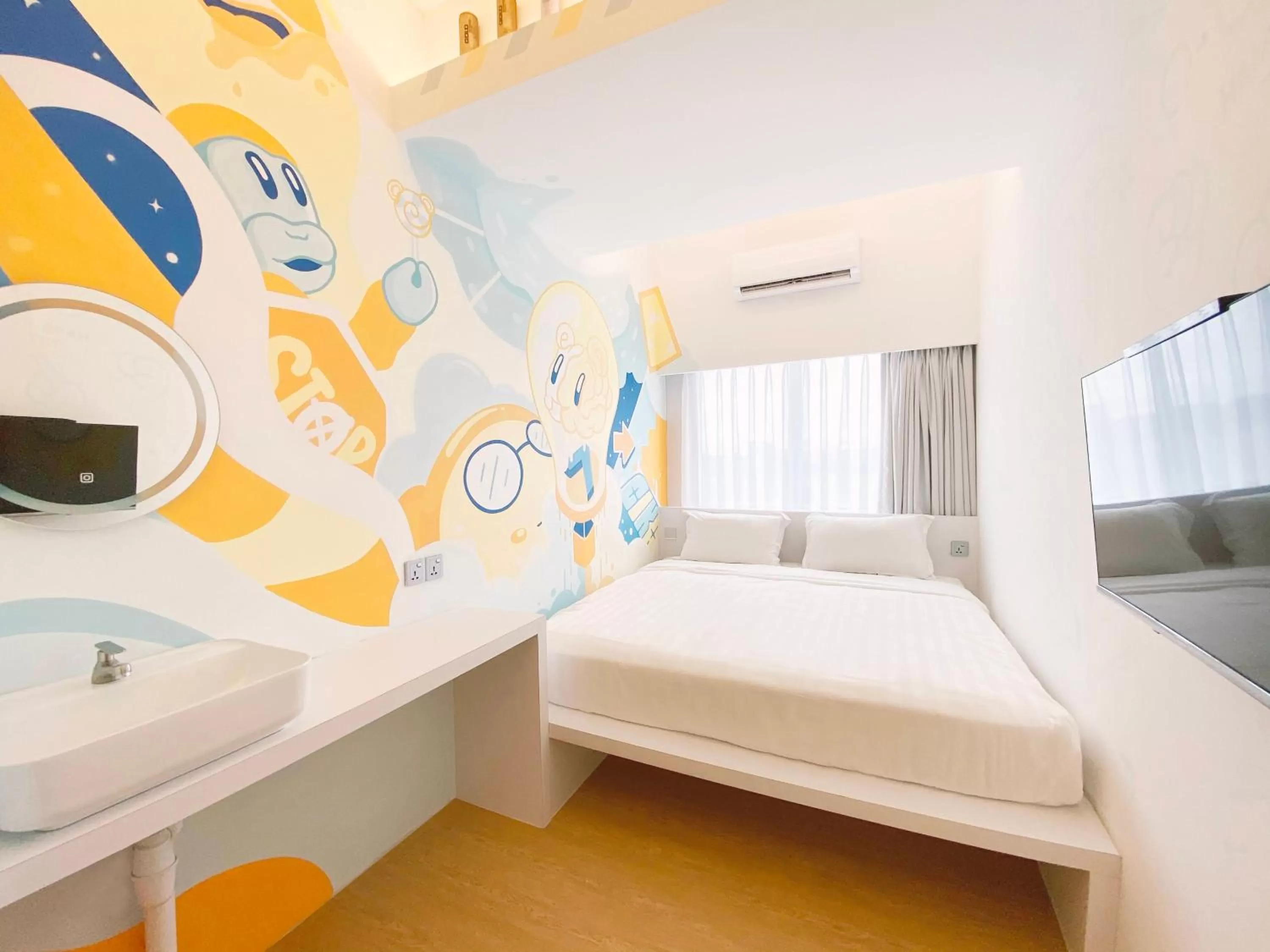 Bed in The Atelier Boutique Hotel