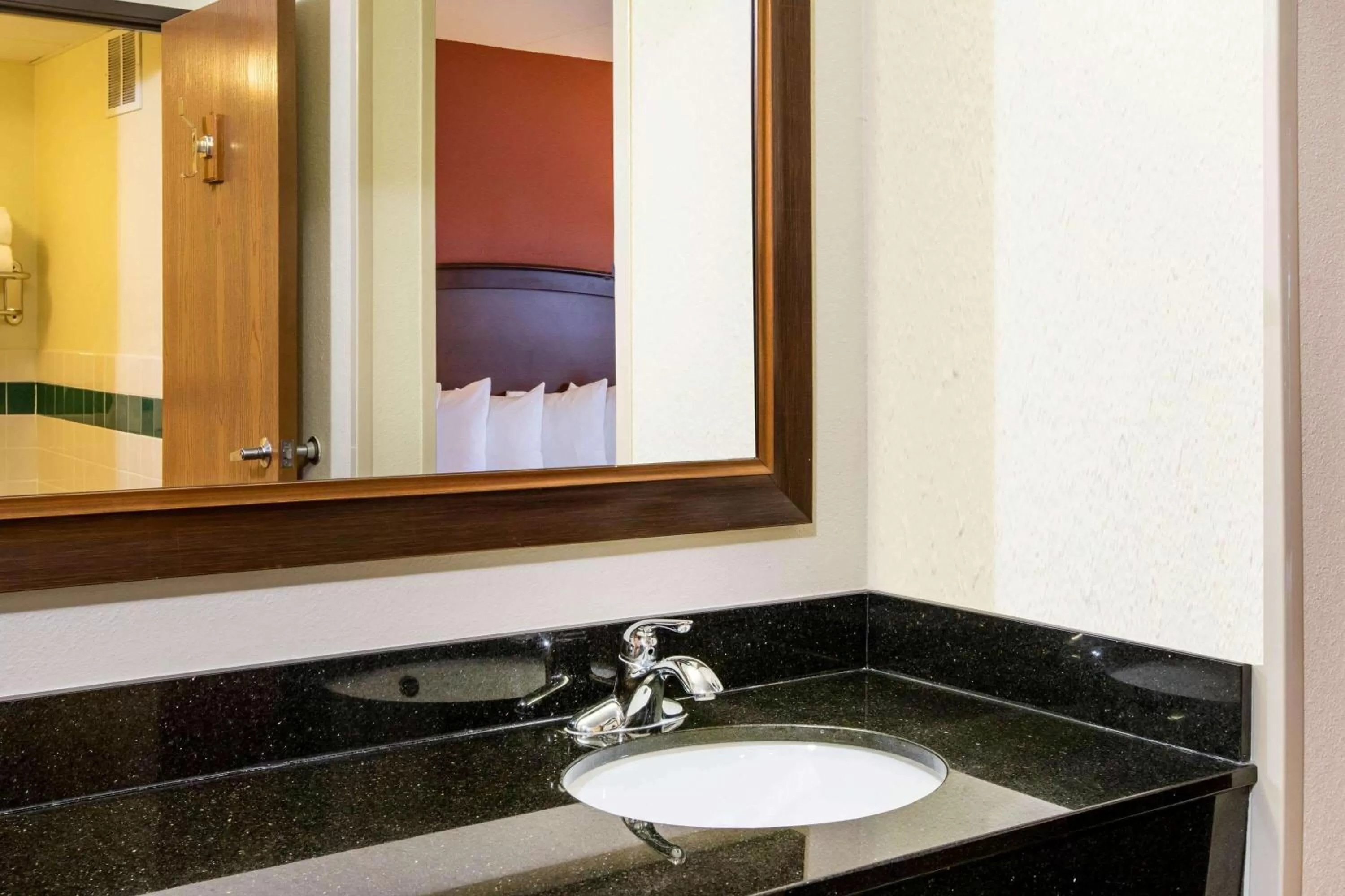 Bathroom in AmericInn by Wyndham Grand Forks