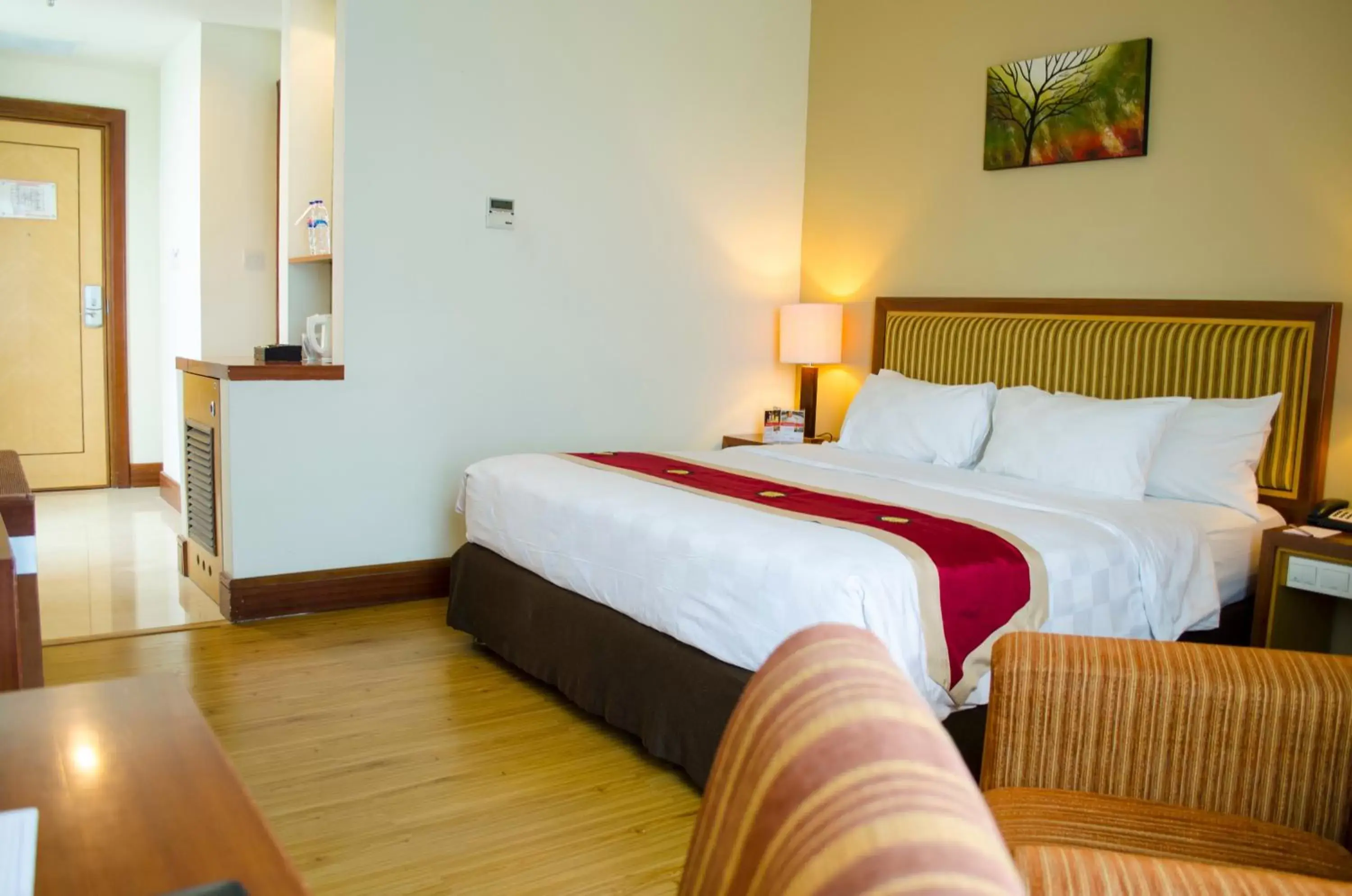 Bed in Swiss-Belhotel Maleosan Manado