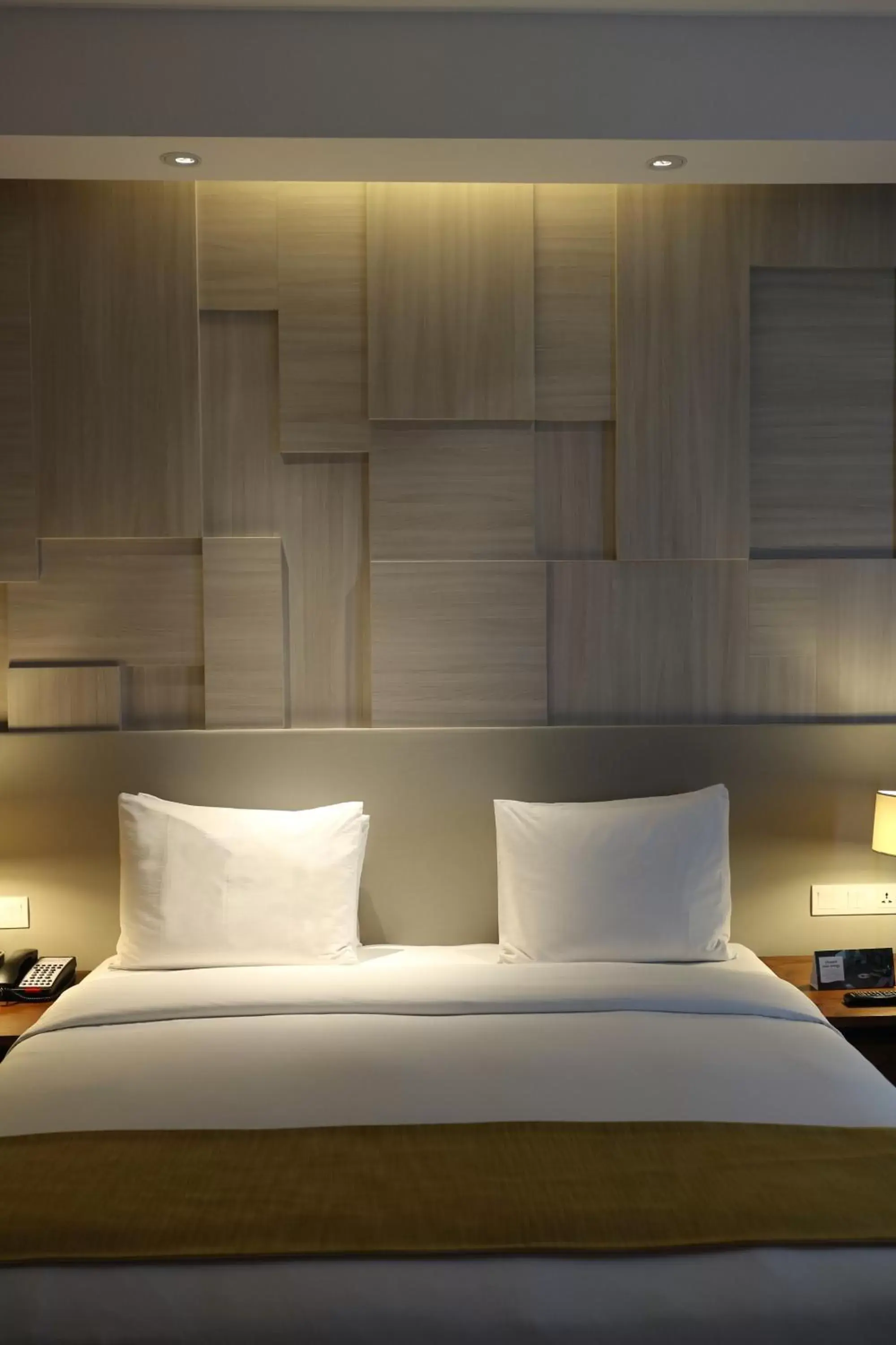 Bed in Crowne Plaza Bandung, an IHG Hotel