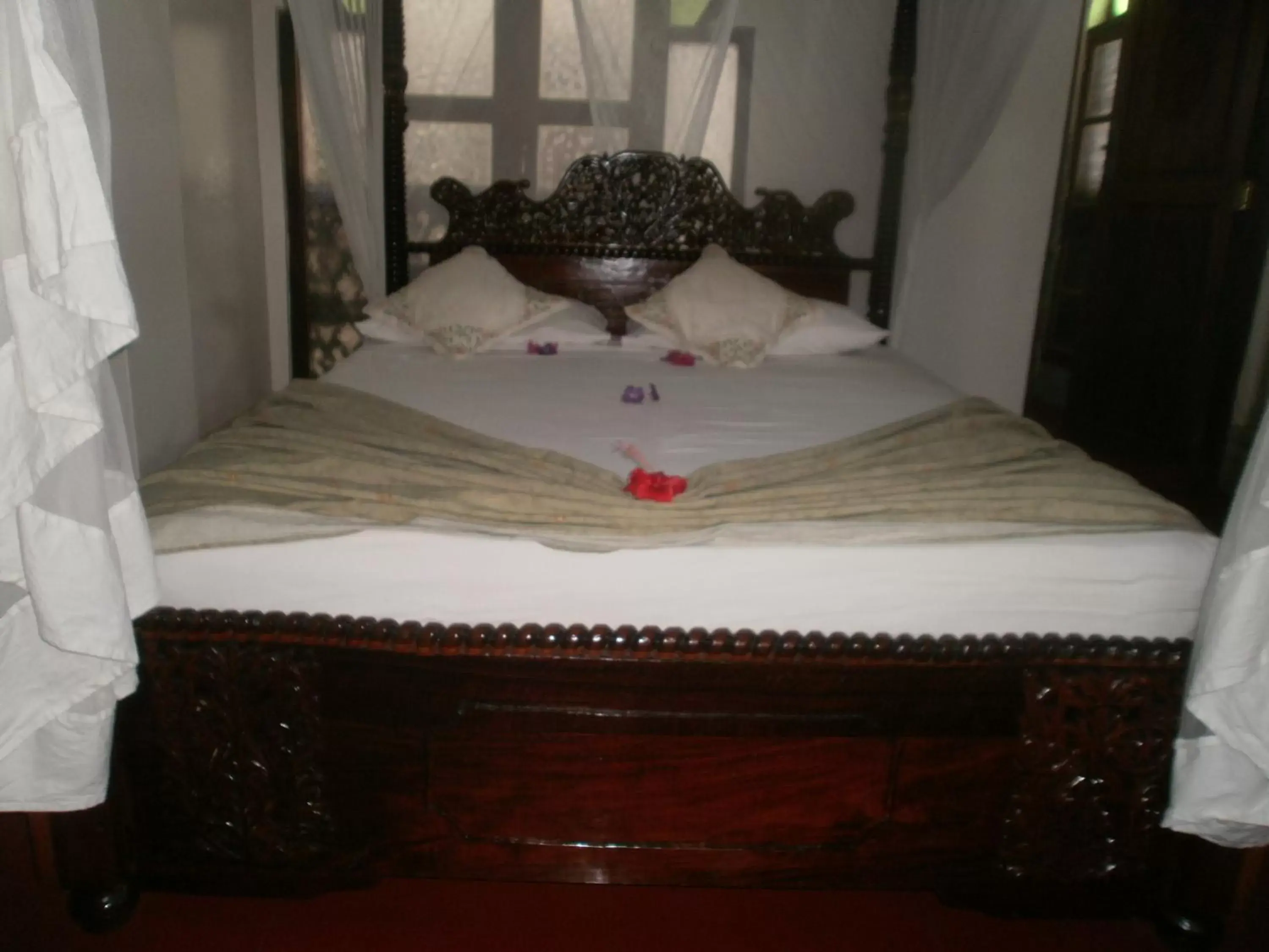 Bed in Asmini Palace Hotel