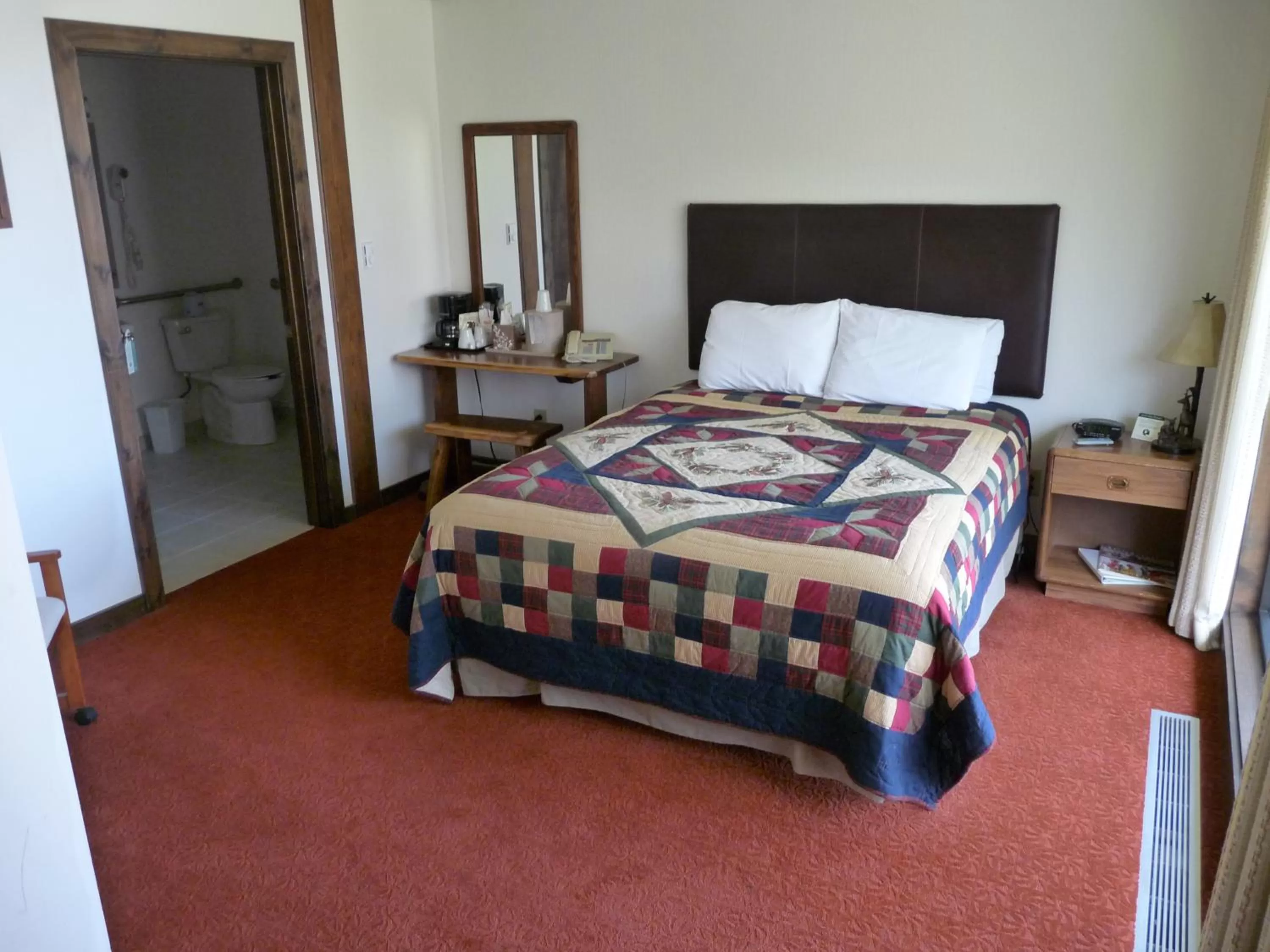 Bed in RiverBank Lodge