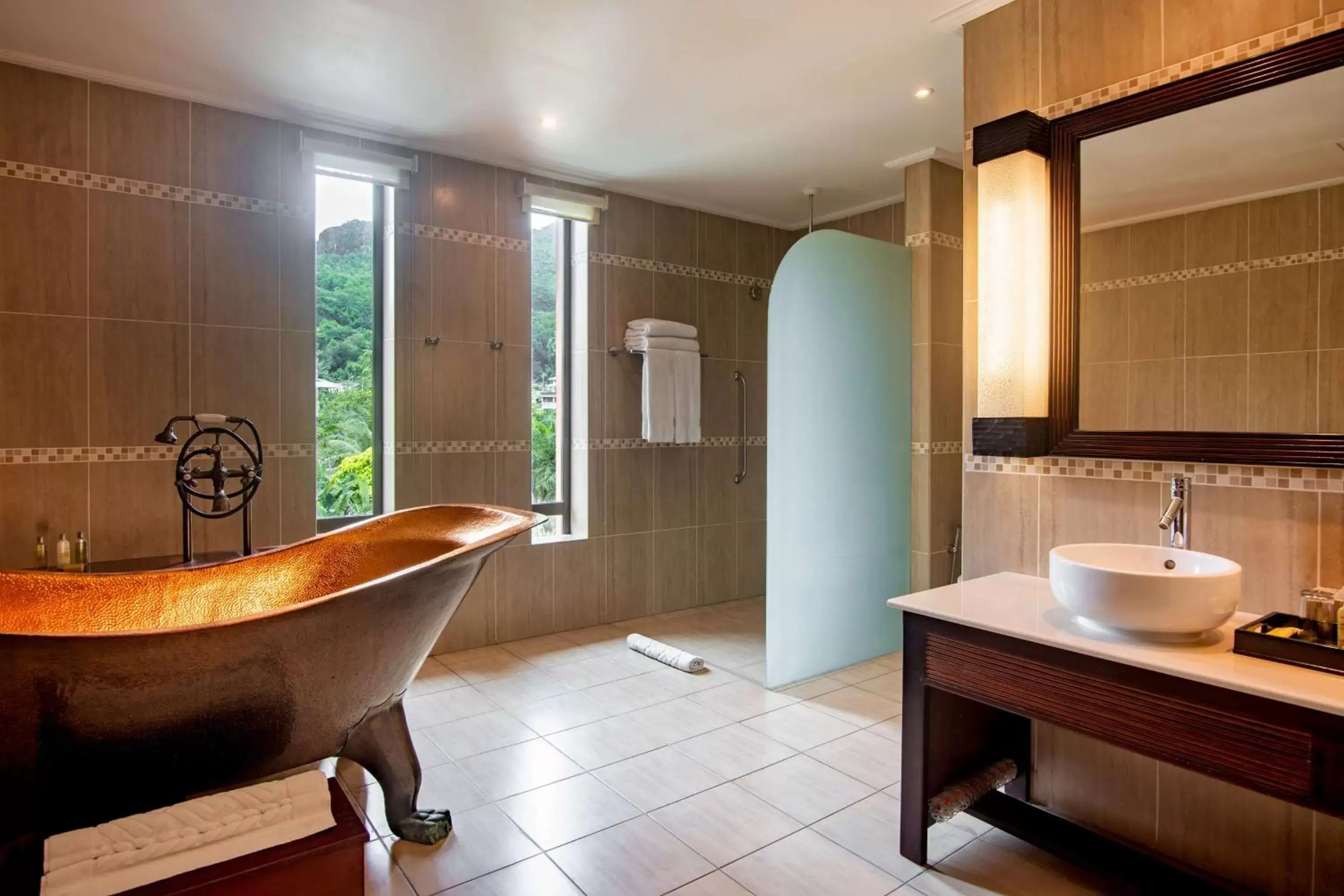 Bathroom in DoubleTree by Hilton Seychelles Allamanda Resort & Spa