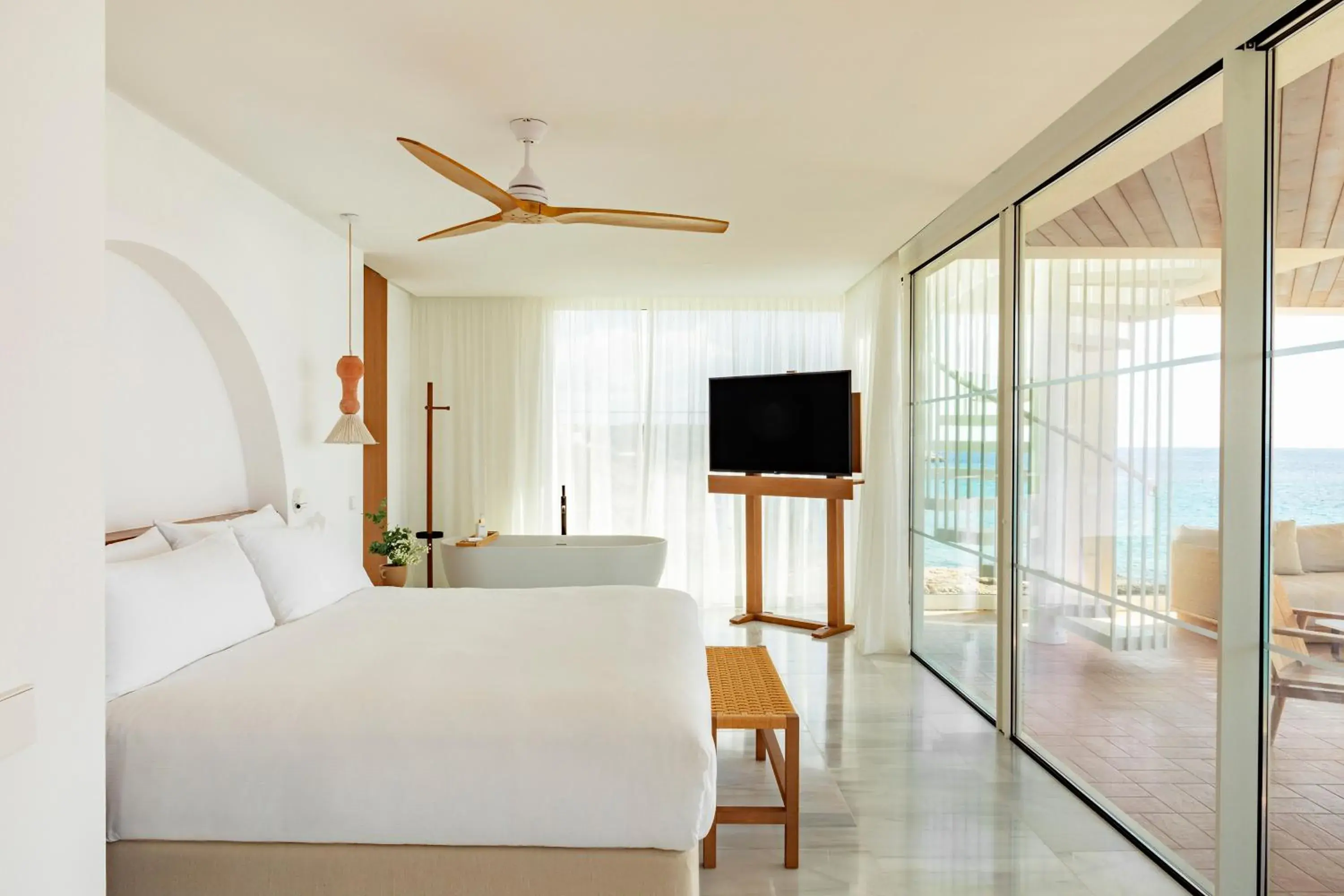 Bed, TV/Entertainment Center in Villa Le Blanc, a Gran Melia Hotel - The Leading Hotels of The World
