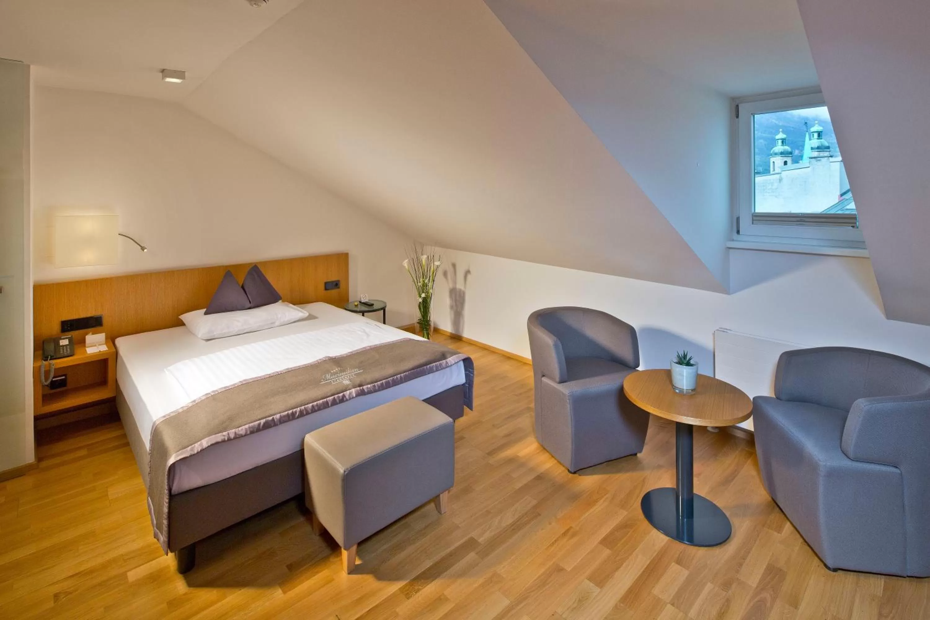 Photo of the whole room, Bed in Hotel Maximilian - Stadthaus Penz