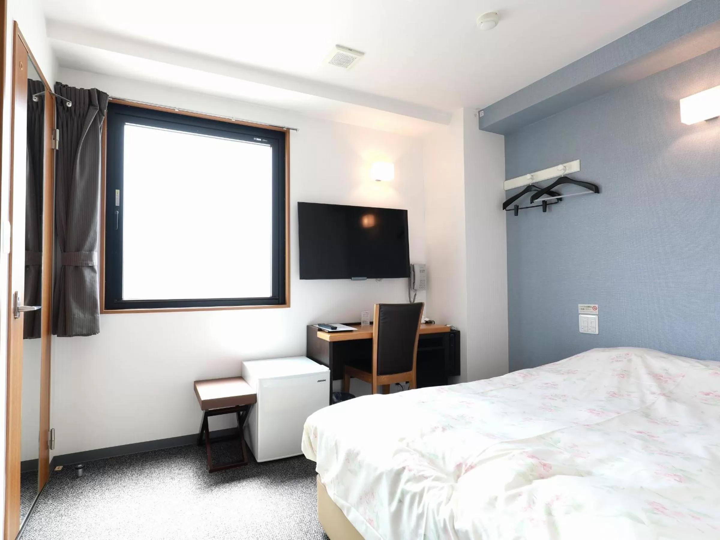 Bed in Toyama Town Hotel