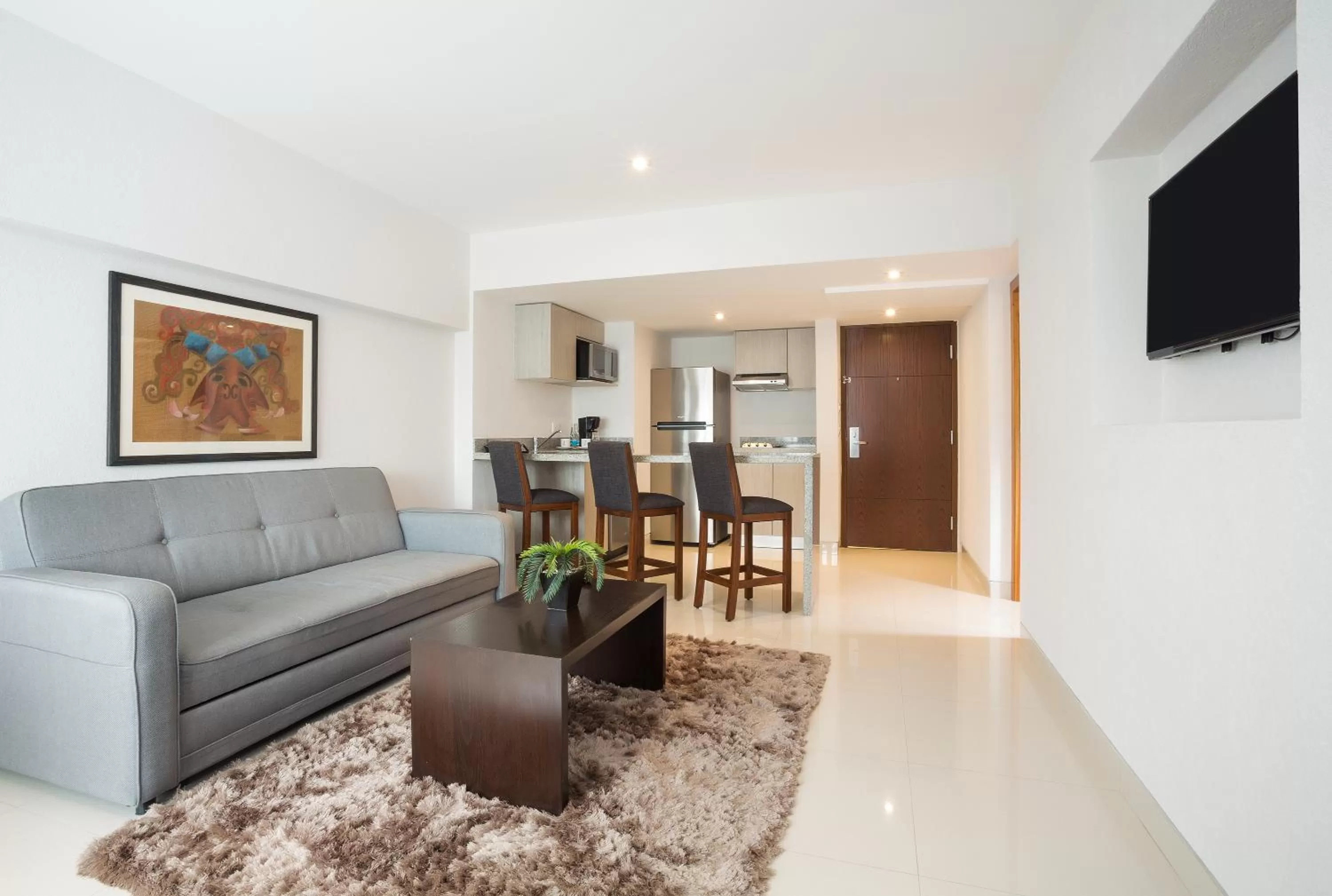 Seating area in Hotel Indigo Guadalajara Expo by IHG