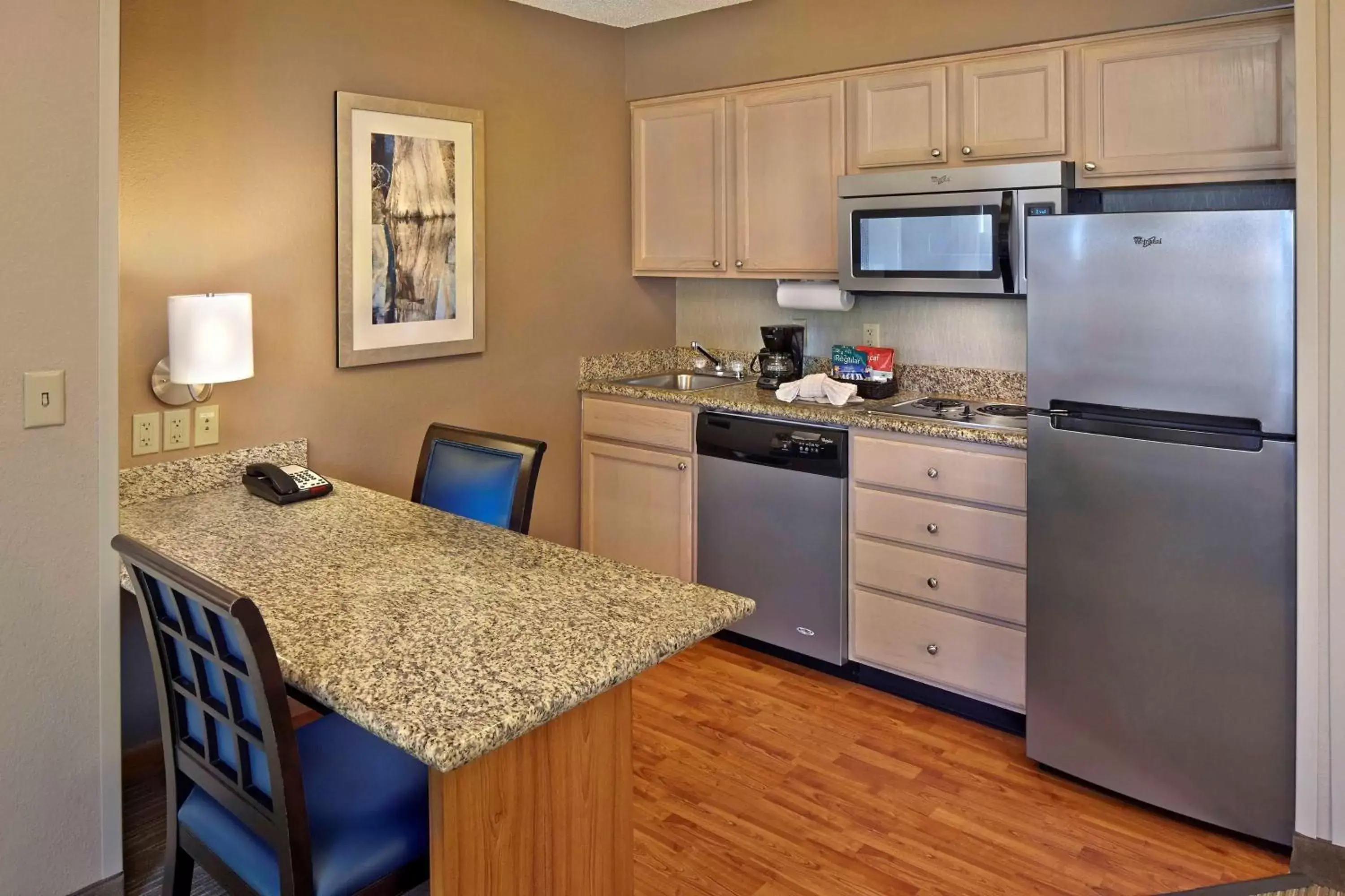 Bedroom, Kitchen/Kitchenette in Homewood Suites by Hilton Lake Mary