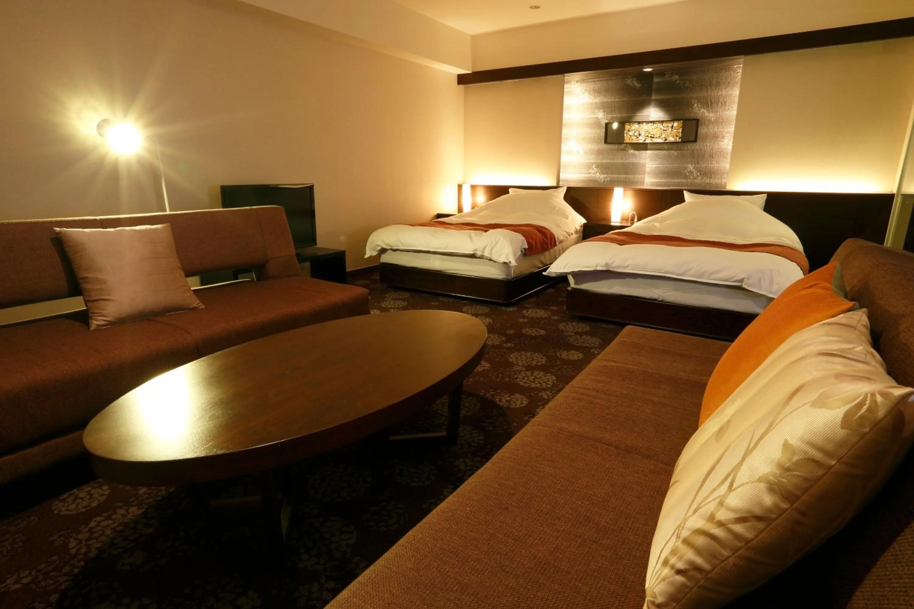 Seating area, Bed in Art & Music Spa Resort Manatei Hakone