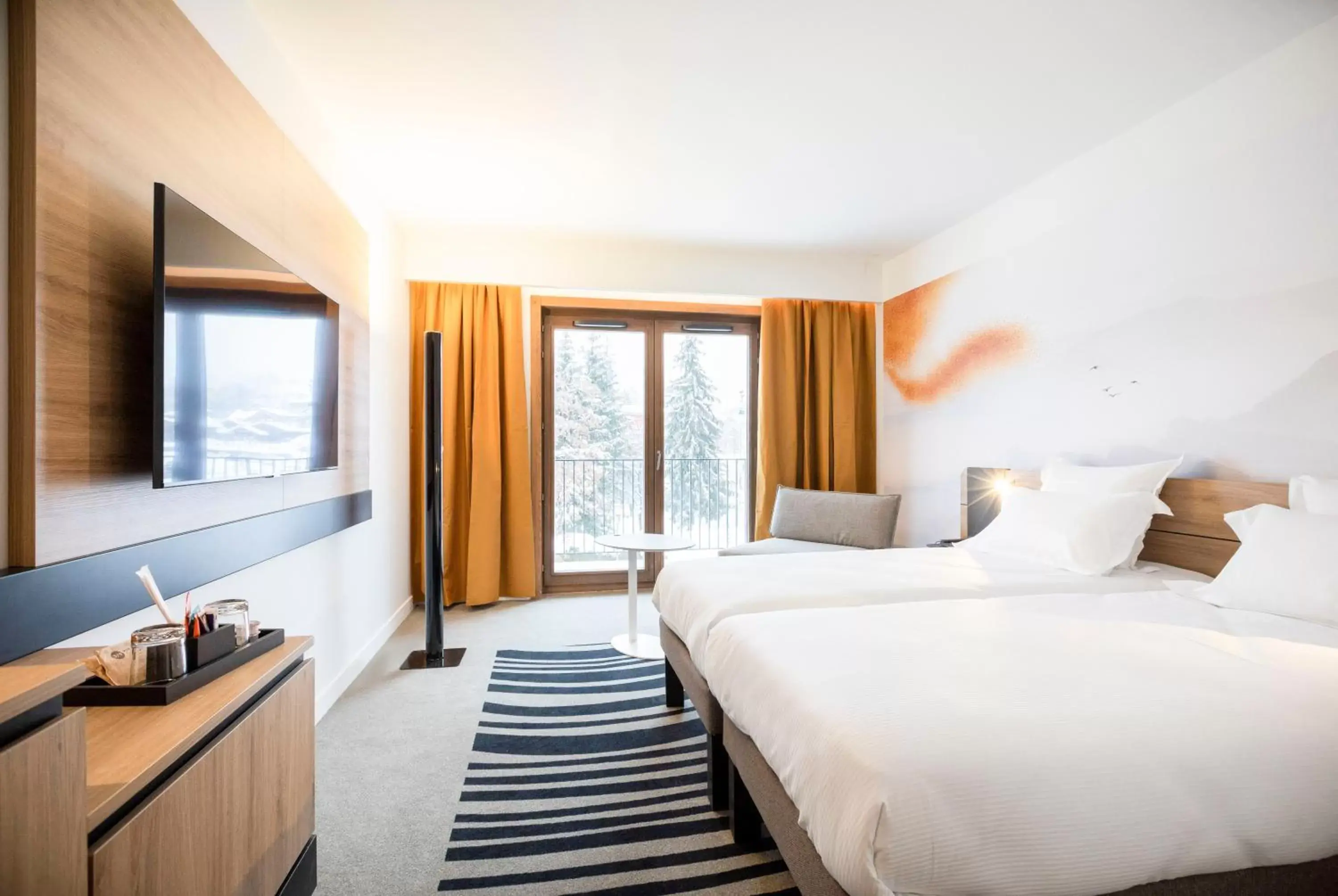 Classic Twin Room with Sofa Bed in Novotel Megève Mont-Blanc