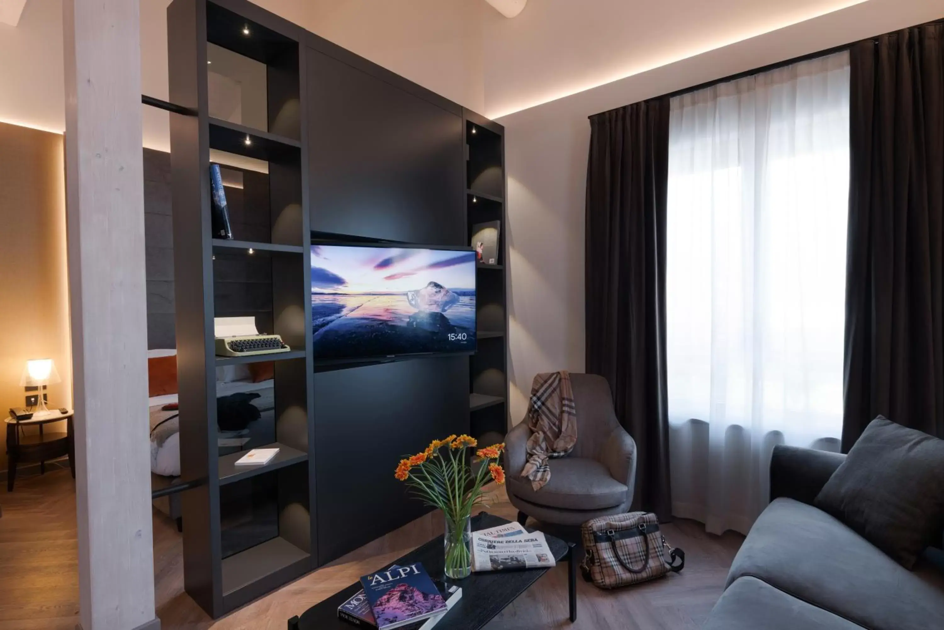 Communal lounge/ TV room, TV/Entertainment Center in 3T Boutique Hotel