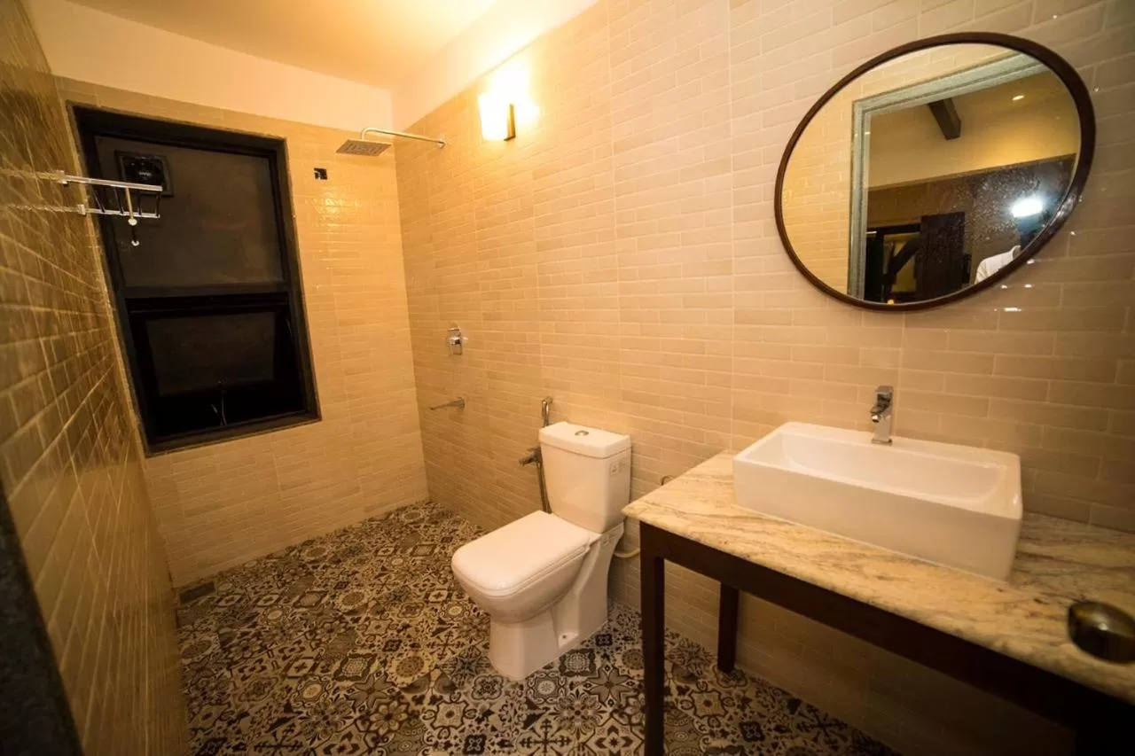 Bathroom in HALF Hotel, Calangute