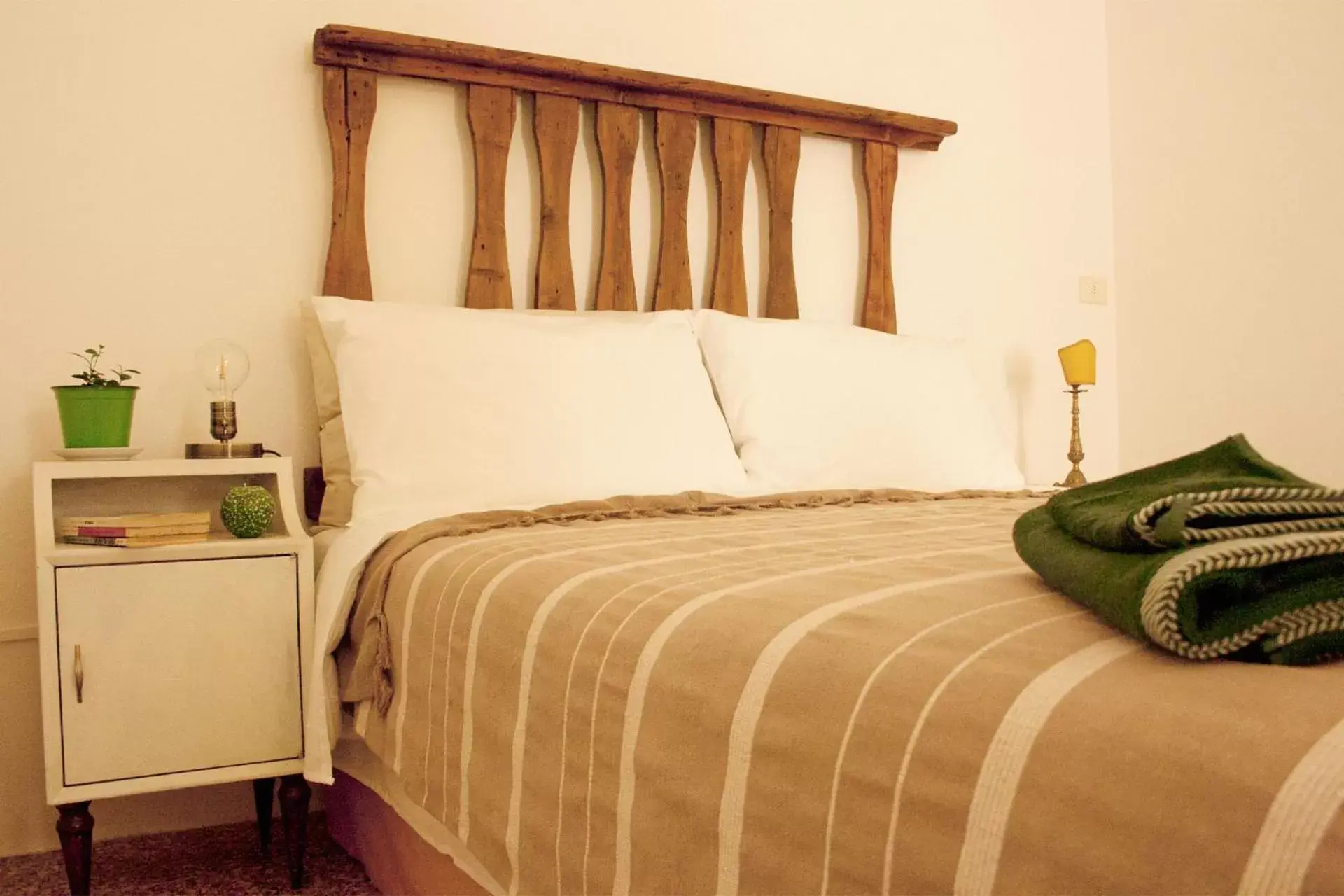 Bed in Ritornello B&B