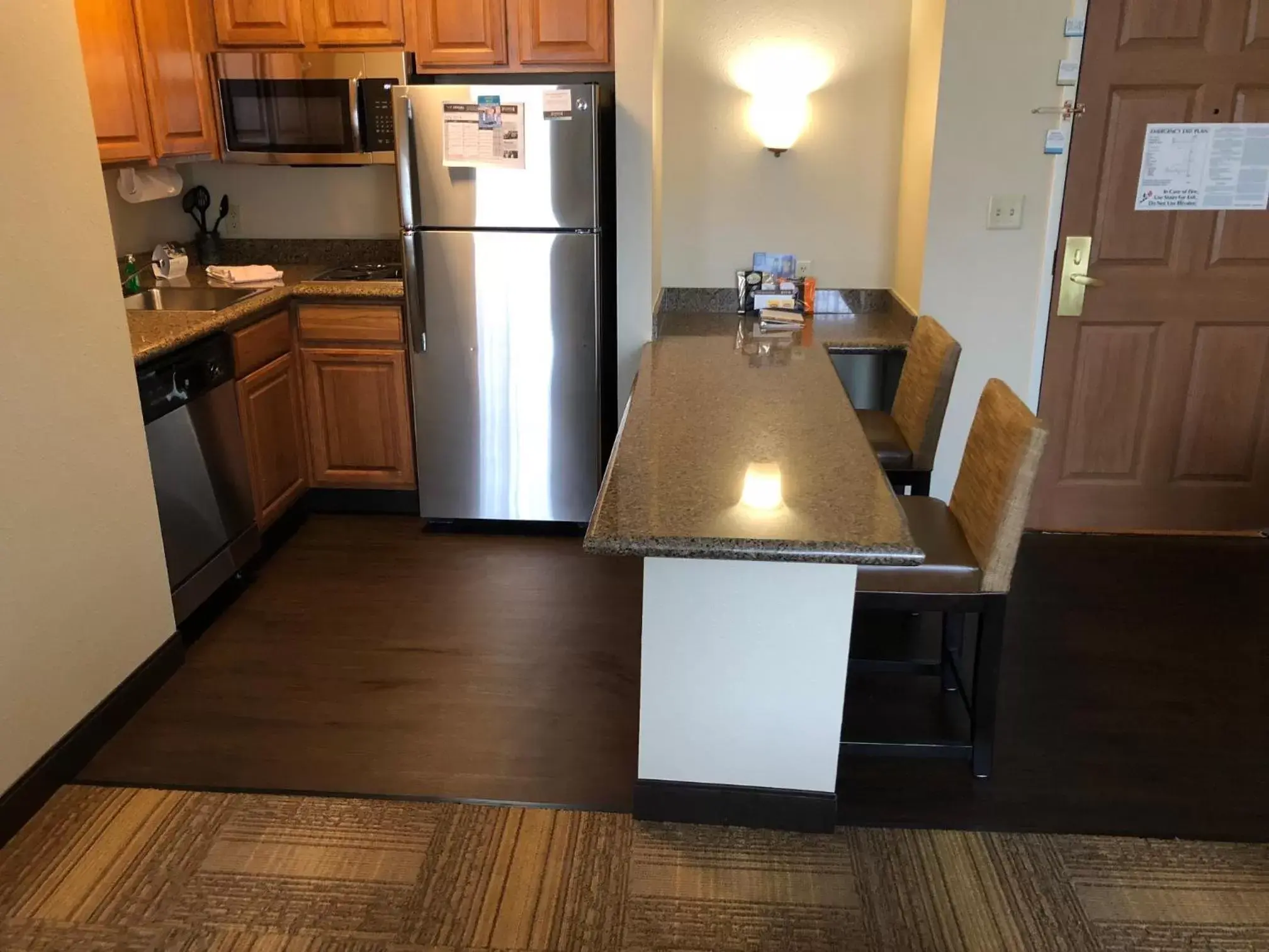 Kitchen or kitchenette, Kitchen/Kitchenette in Staybridge Suites Grand Rapids-Kentwood, an IHG Hotel