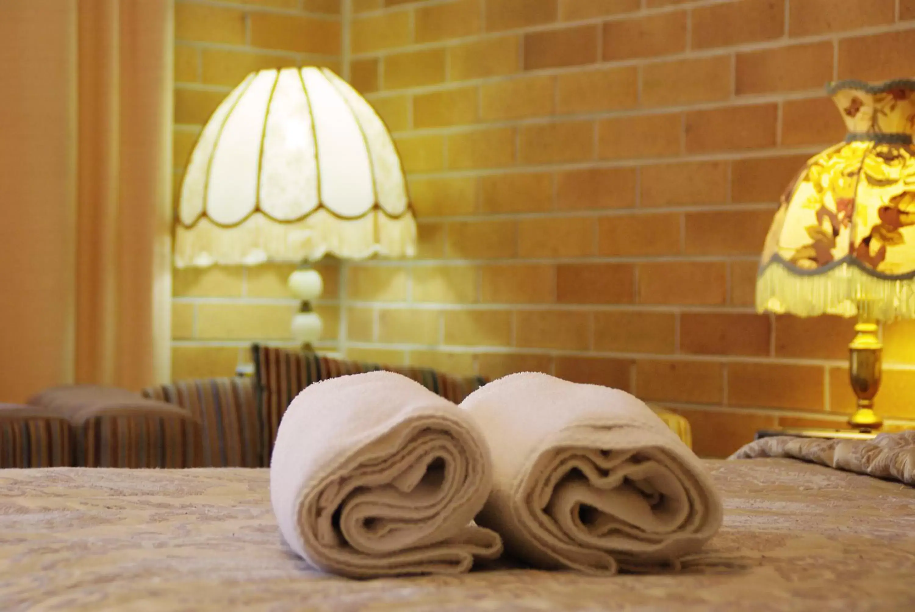 towels, Bed in White Lanterns Motel