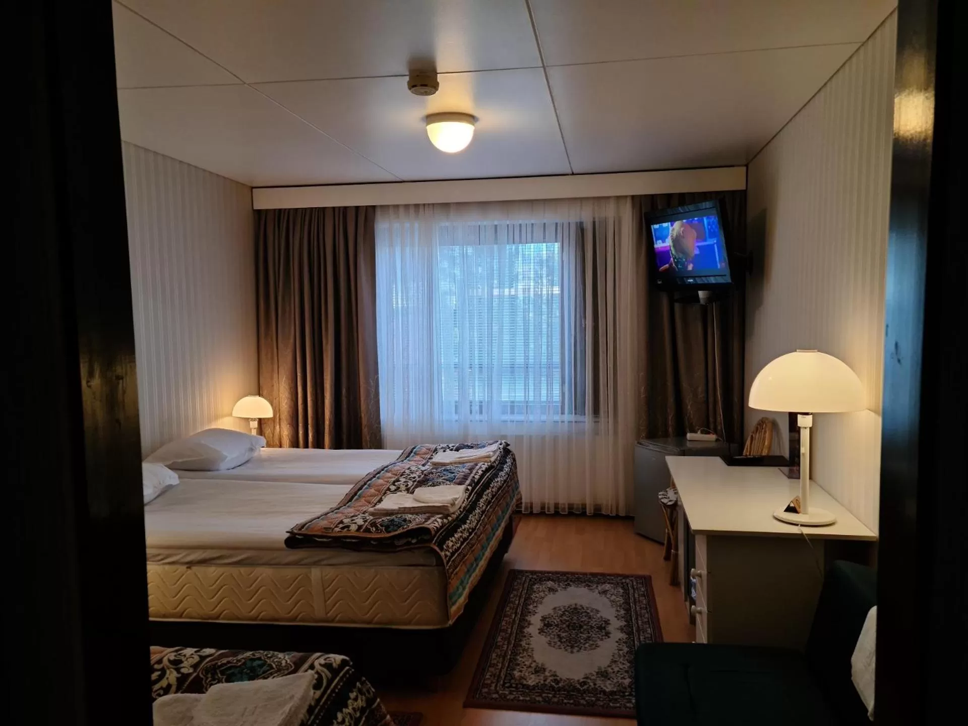 Bed in Hotelli Sandels