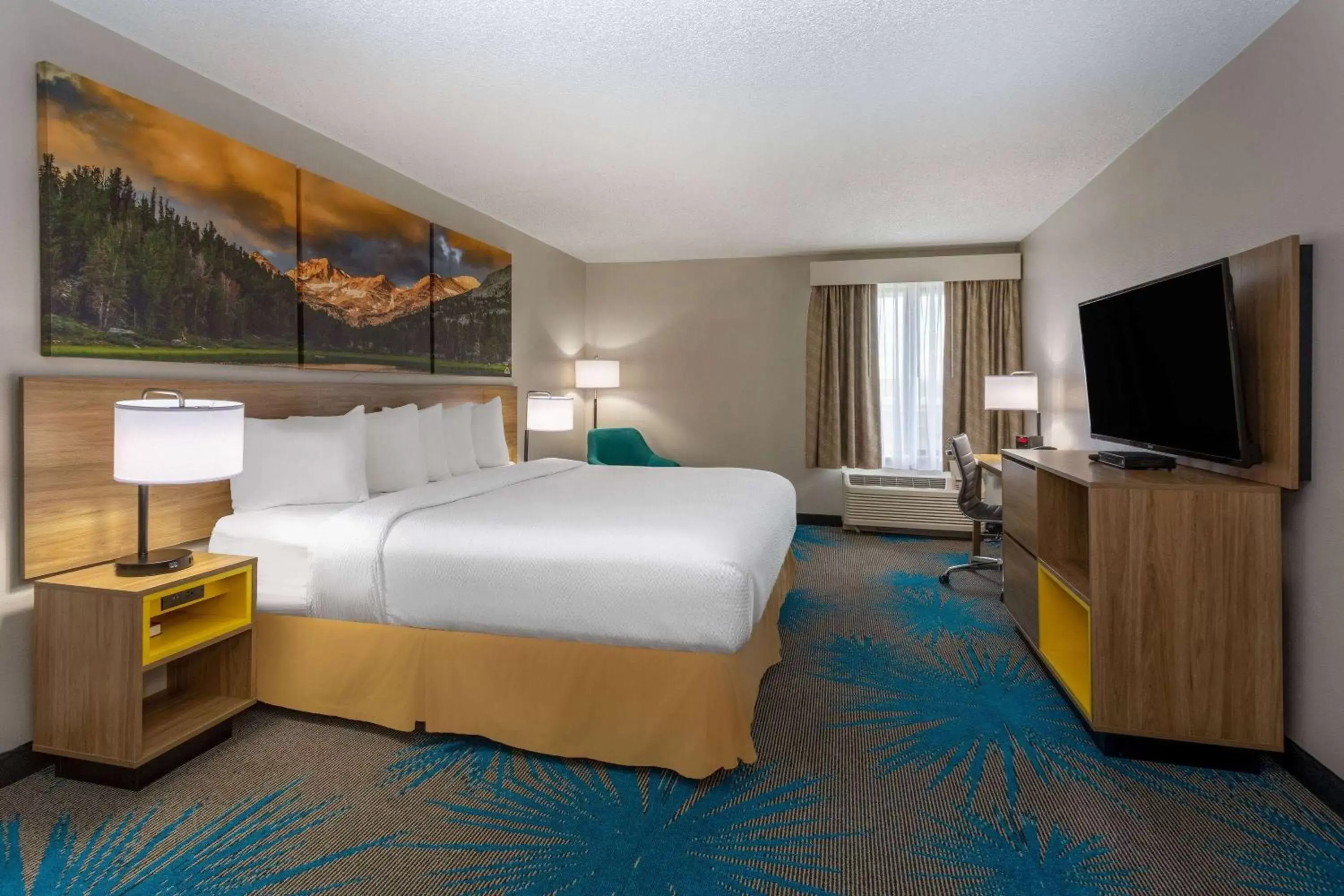 Photo of the whole room in Days Inn & Suites by Wyndham Denver International Airport