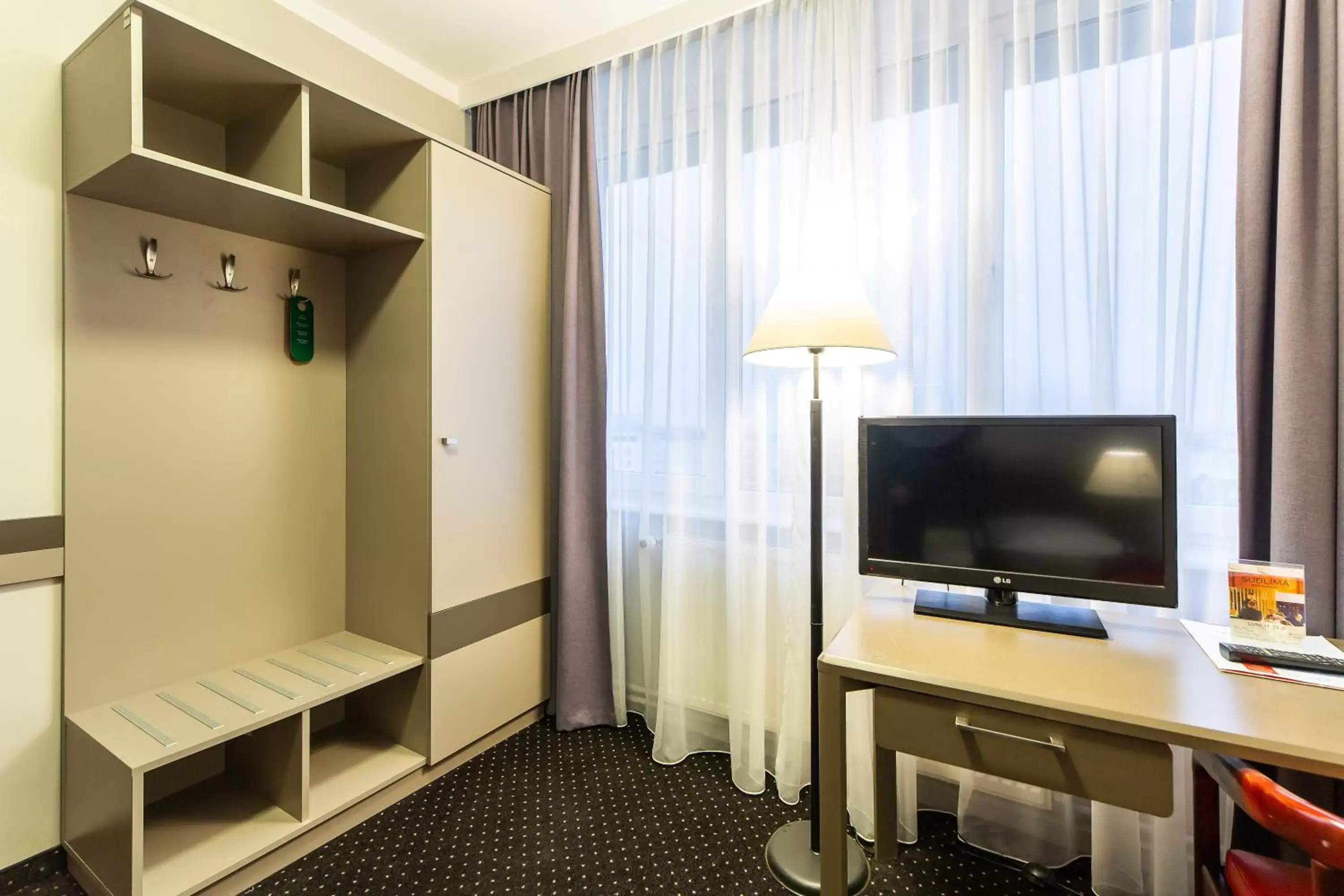 Photo of the whole room, TV/Entertainment Center in Hotel New Skanpol