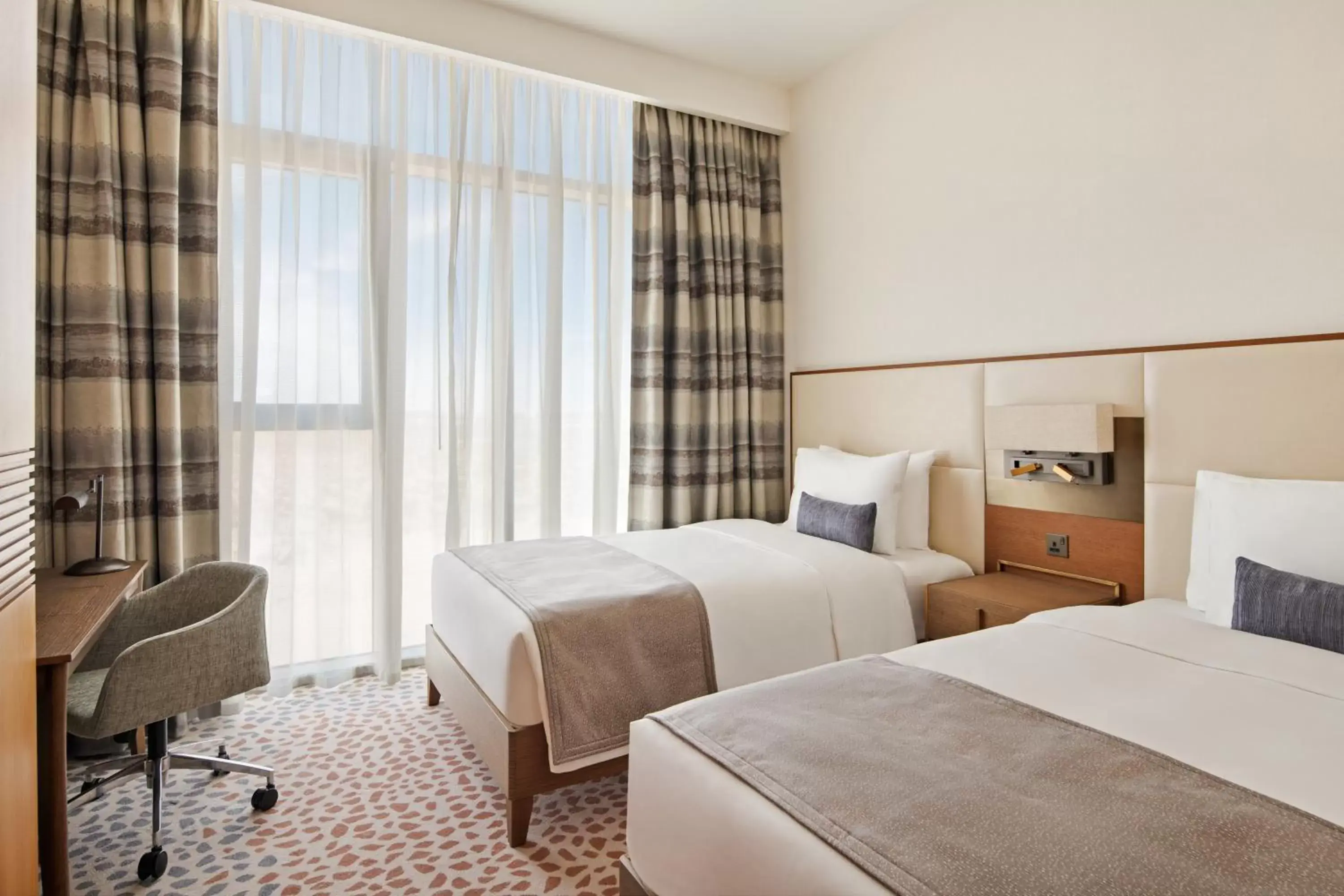 Bed in Staybridge Suites Dubai Al-Maktoum Airport by IHG Bed in Staybridge Suites Dubai Al-Maktoum Airport by IHG
