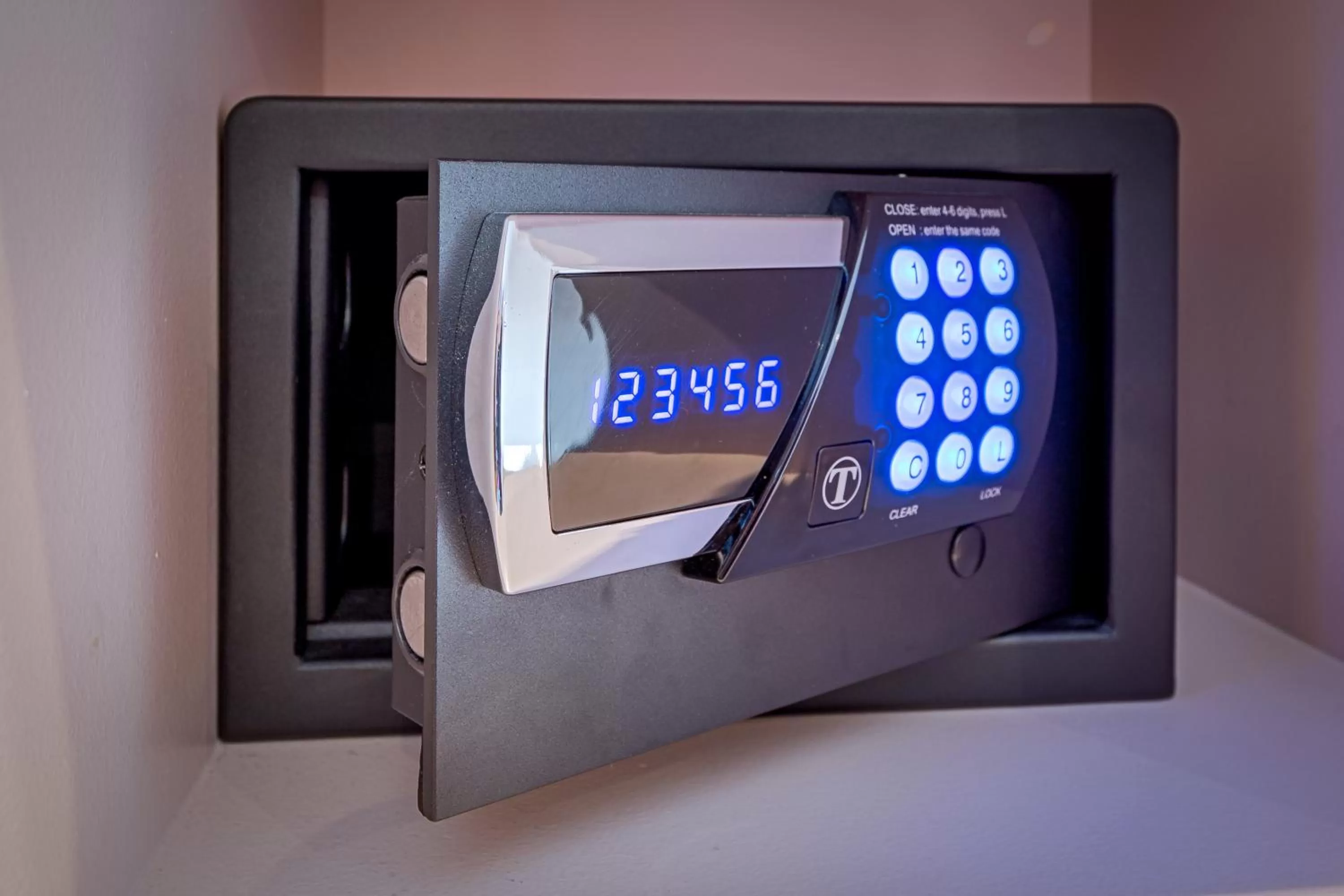 Bedroom, TV/Entertainment Center in Pink Hotel