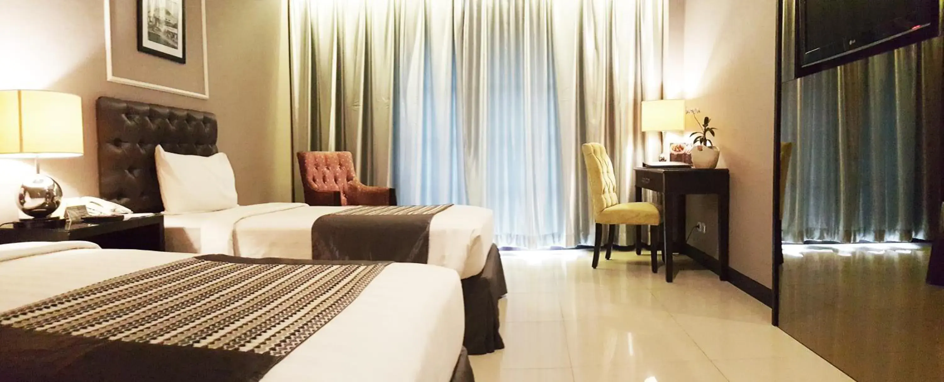 Photo of the whole room, Bed in The Mirah Bogor Hotel