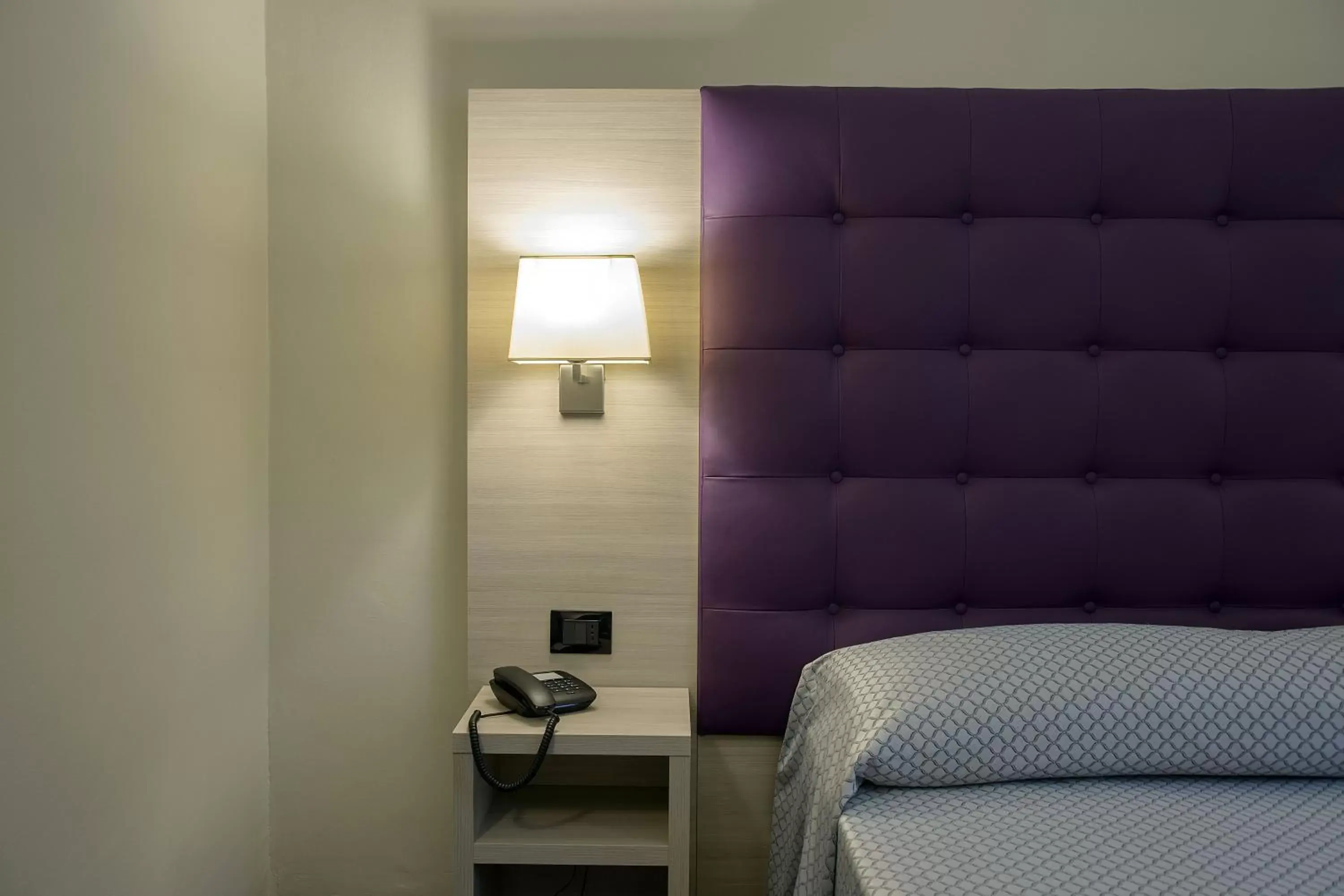 Bed, Seating Area in Hotel Torino Porta Susa