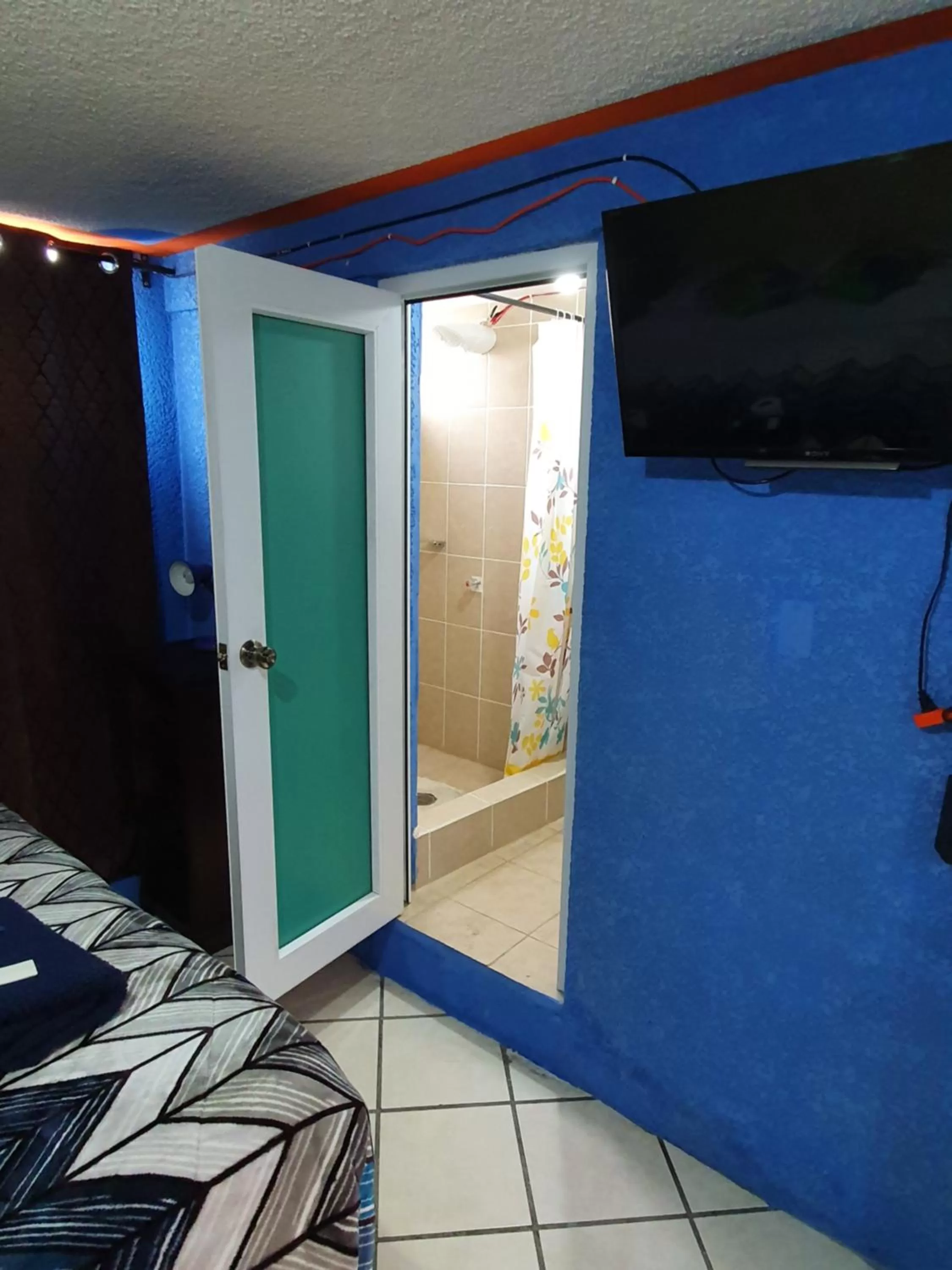 TV/Entertainment Center in hotel kasa kamelot 2