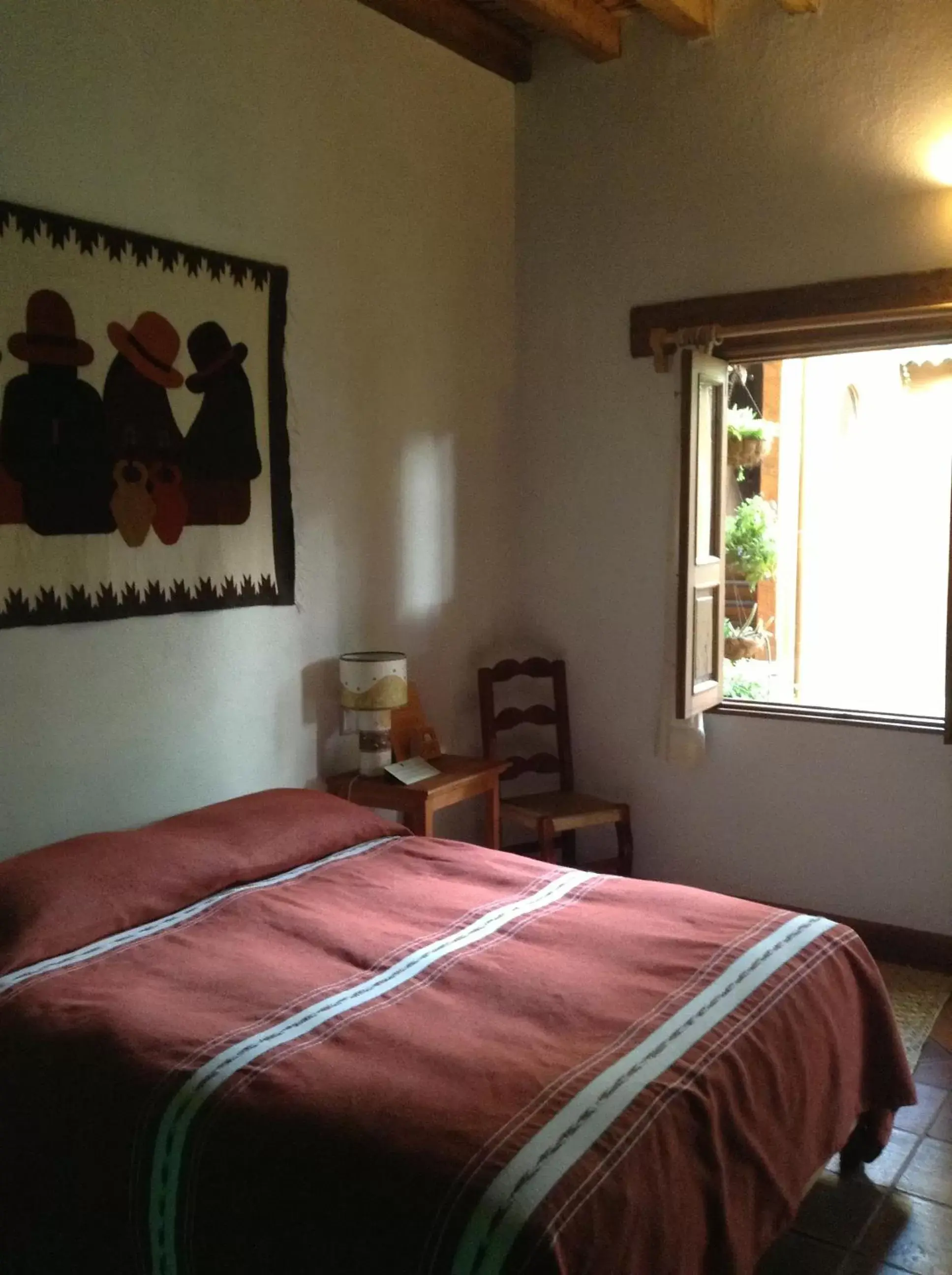 Photo of the whole room, Bed in Posada Yolihuani