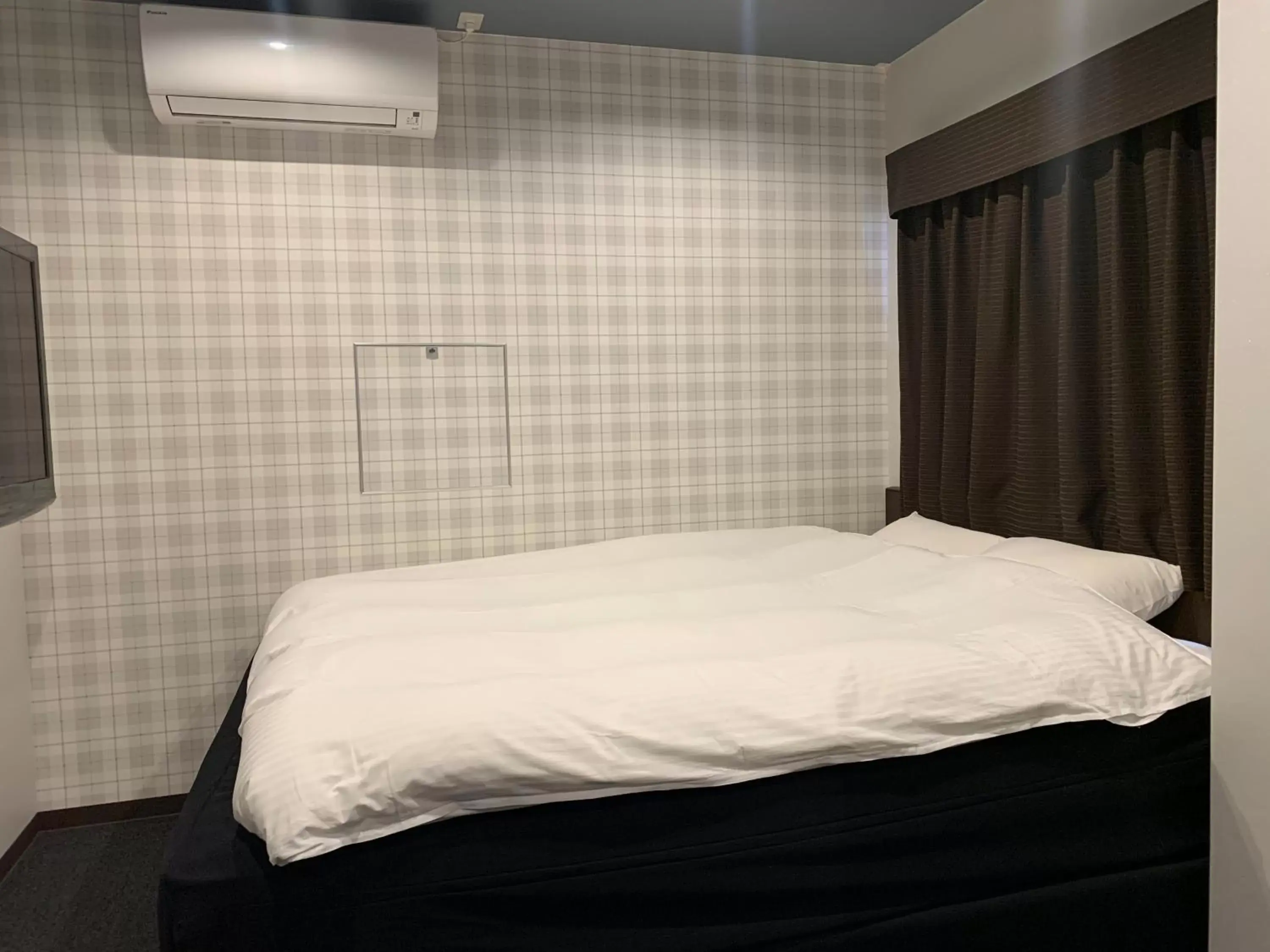 Bed in Nagoyaeki Access Hotel