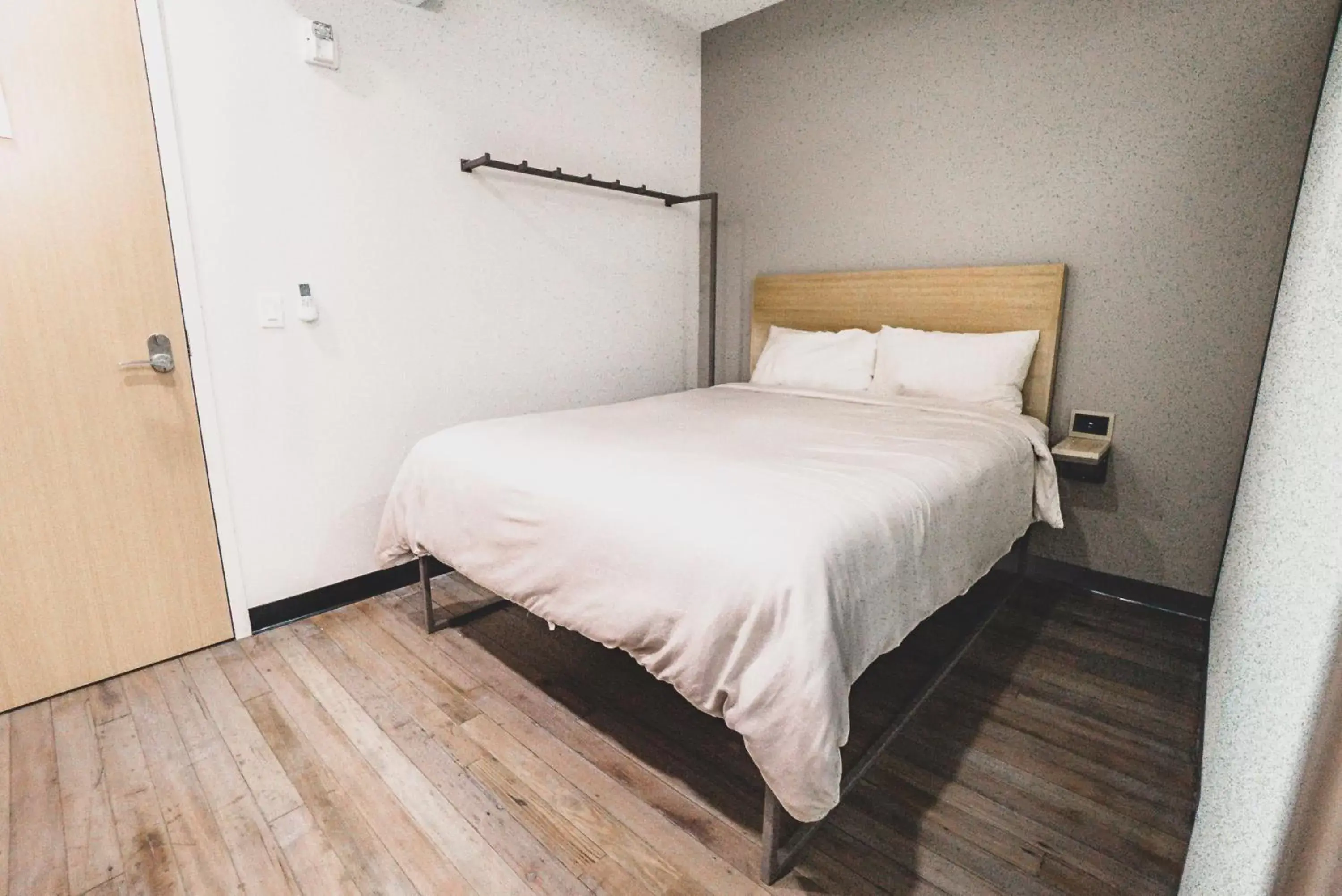 Bed in SOVA Micro-Room & Social Hotel