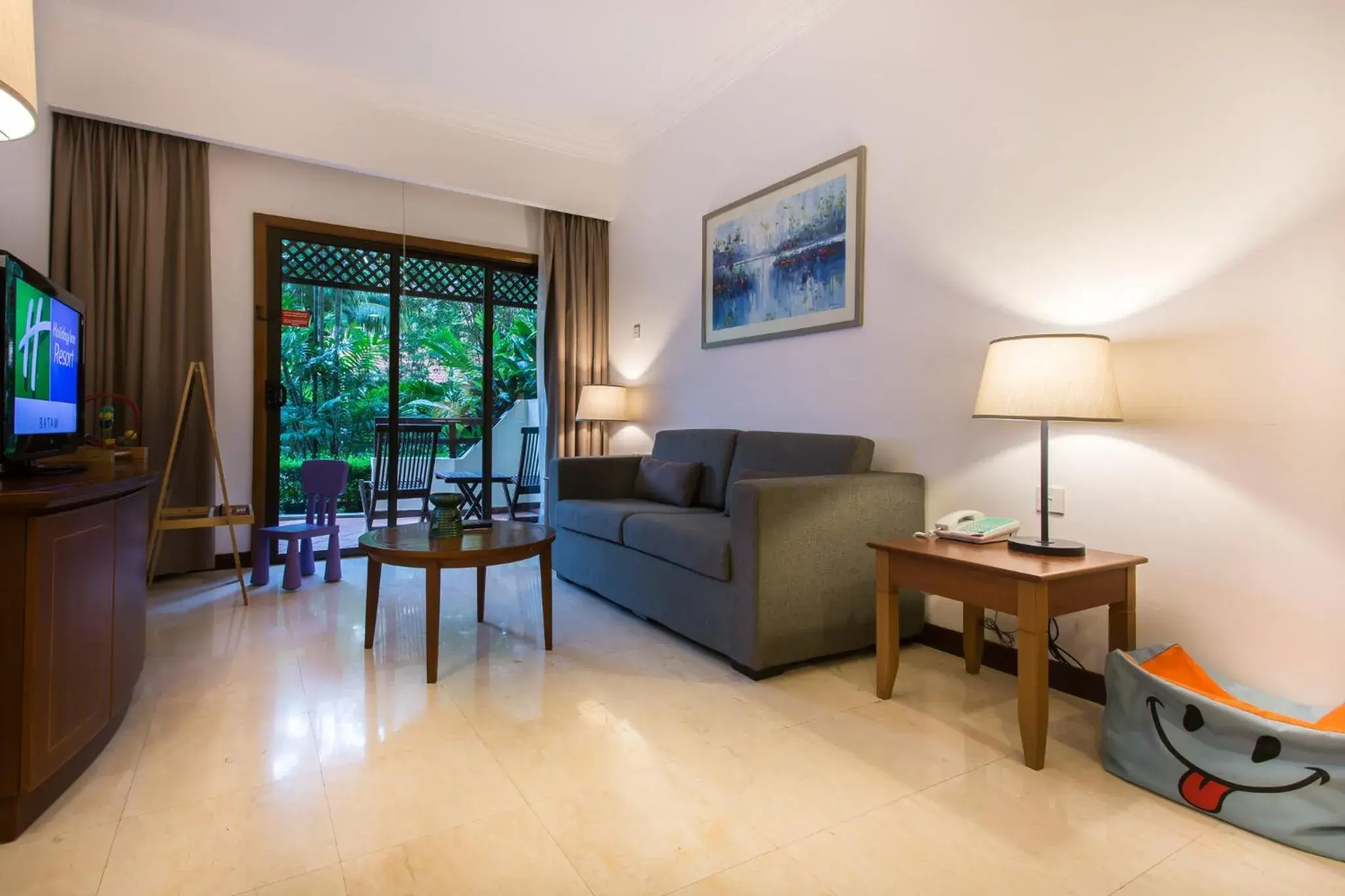 Photo of the whole room, Seating Area in Holiday Inn Resort Batam, an IHG Hotel