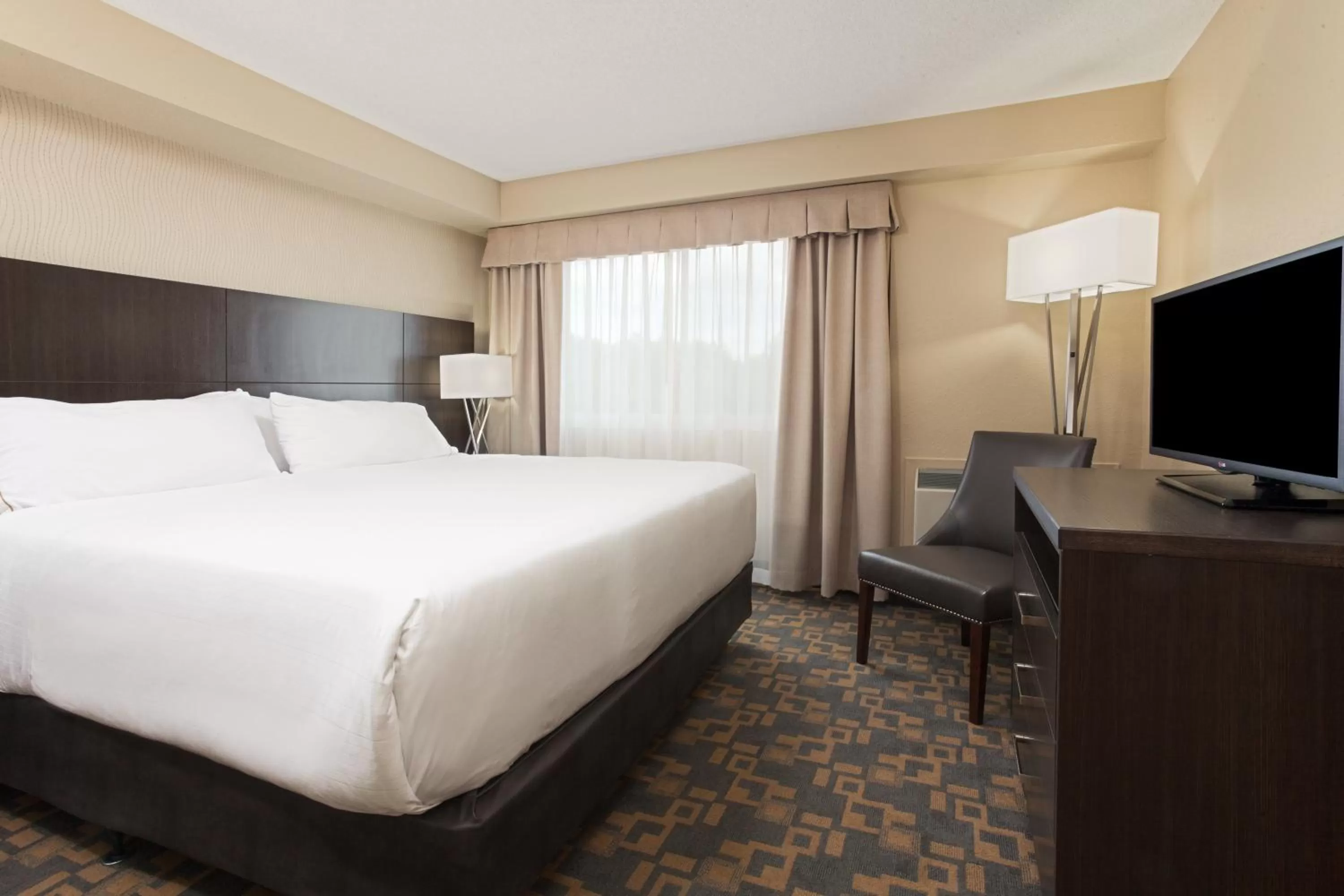 Photo of the whole room, Bed in Holiday Inn Express Hotel & Suites Uptown Fredericton by IHG