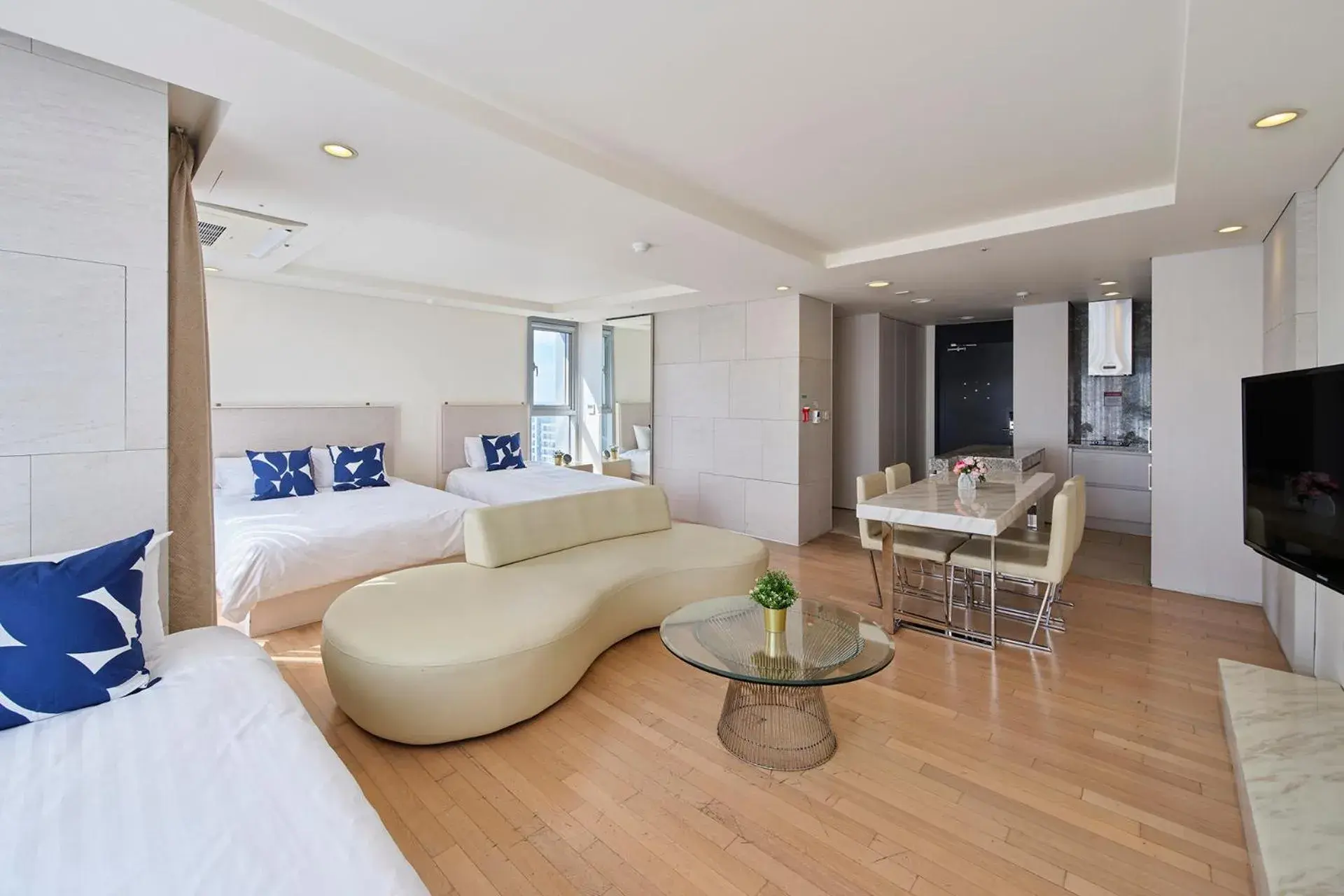 Bed, Seating Area in The Island Blue Hotel