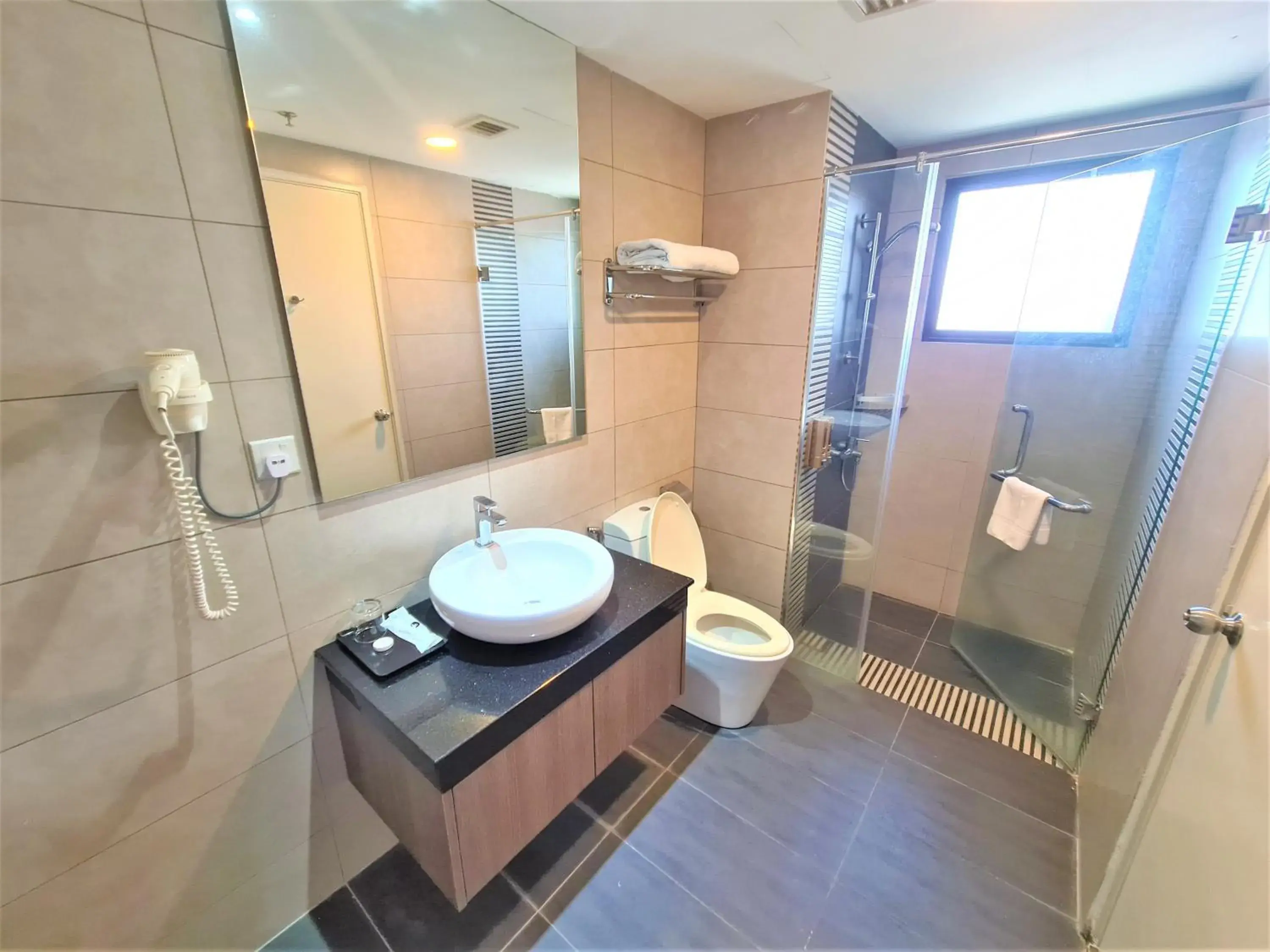 Bathroom in Nexus Regency Suites & Hotel