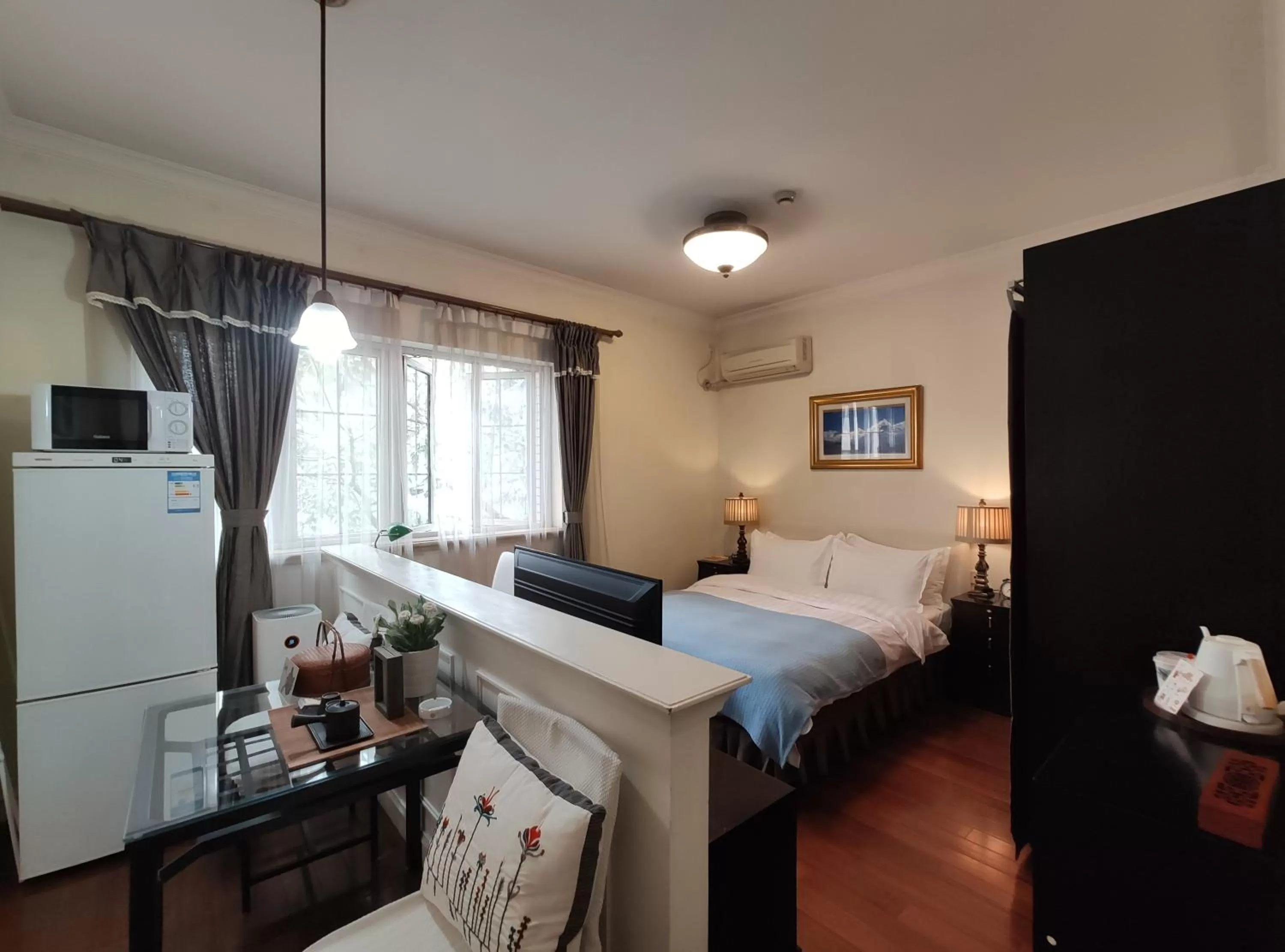 Bed in Ladoll Service Apartments