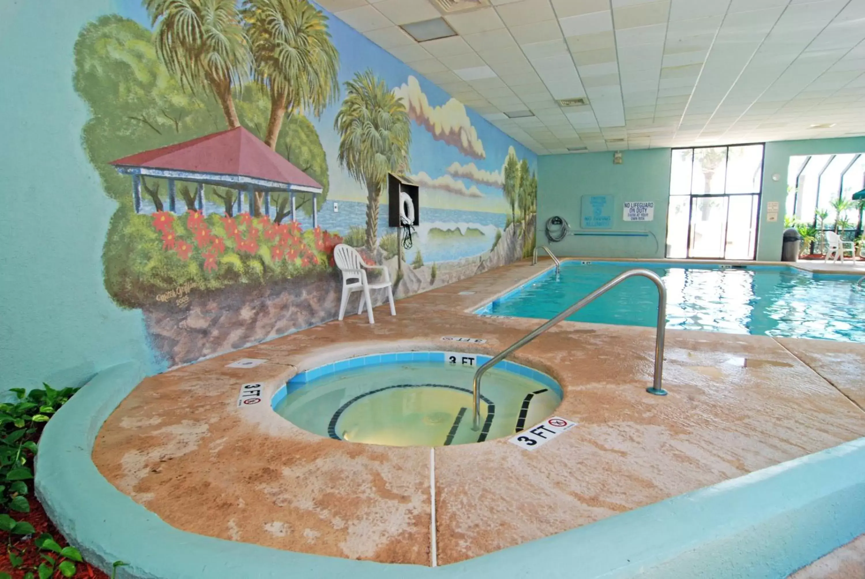 Property building, Swimming Pool in Ocean Forest Plaza by Palmetto Vacations