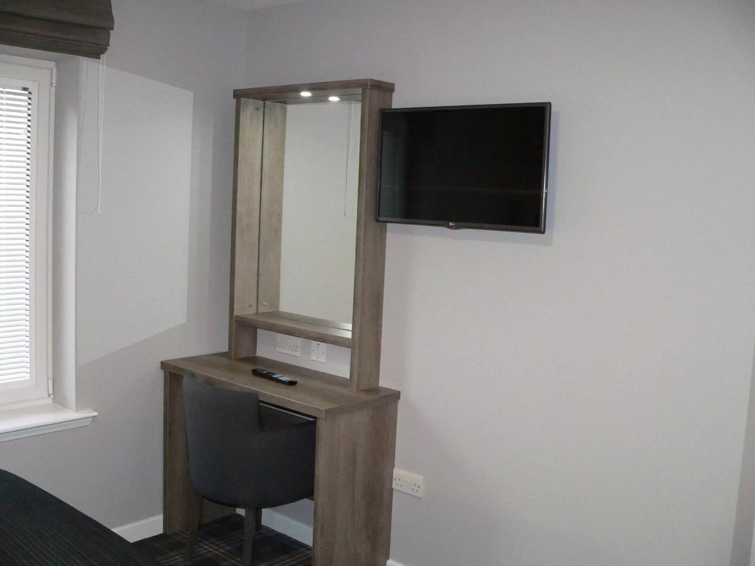 Seating area, TV/Entertainment Center in Ayre Hotel & Ayre Apartments